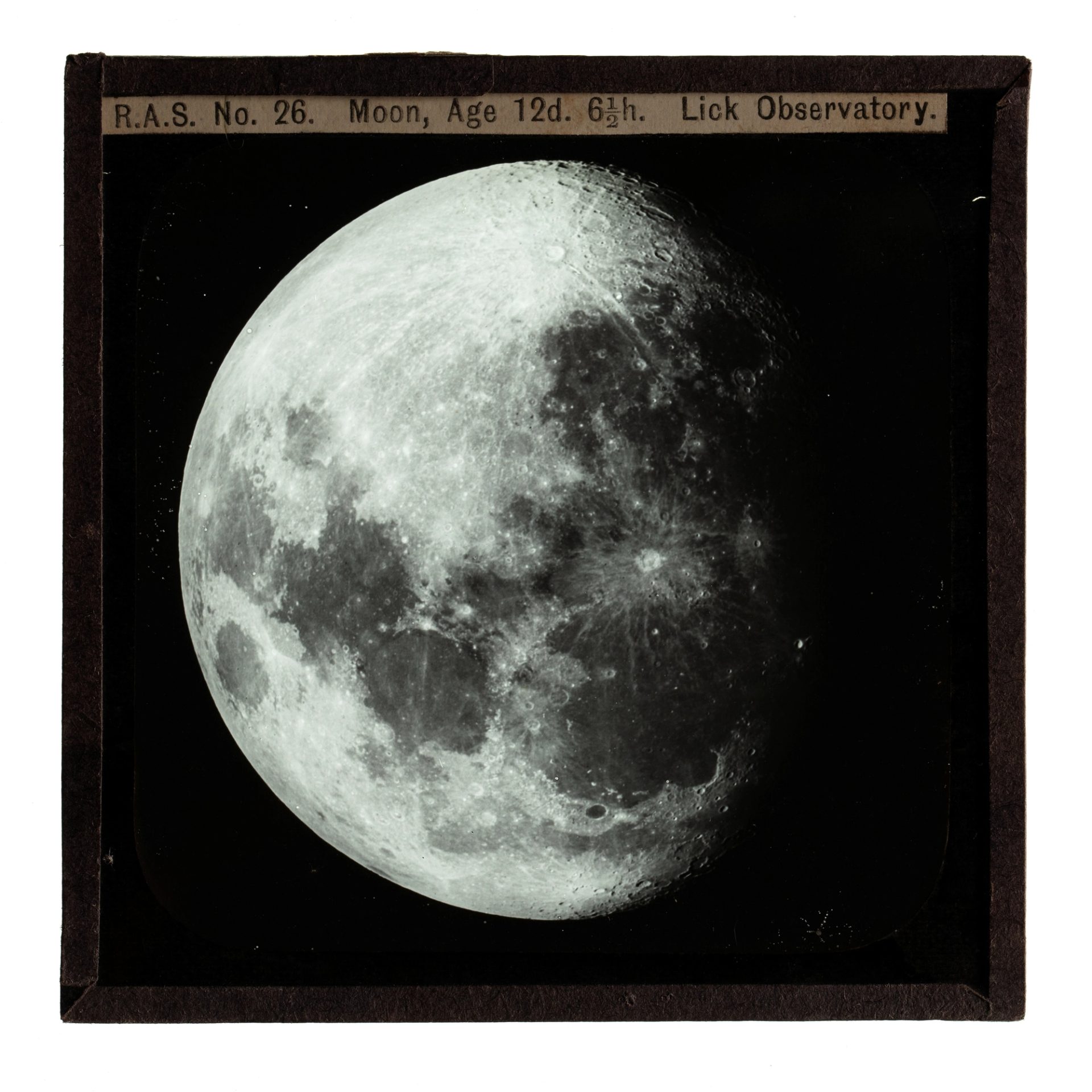 Photograph of a glass plate slide used for teaching astronomy depicting the Moon from Lick Observatory.