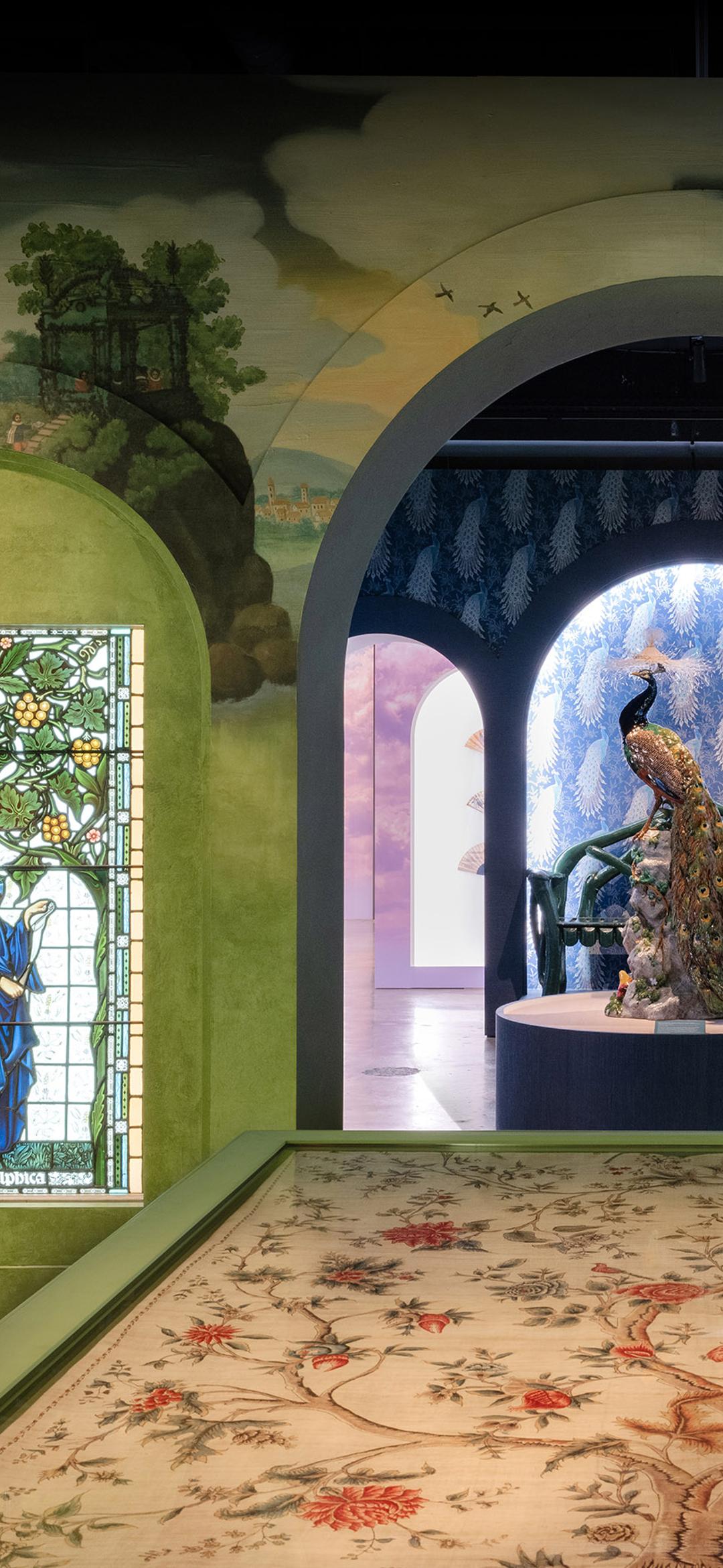 Arches in a room with eclectic collection items on display.