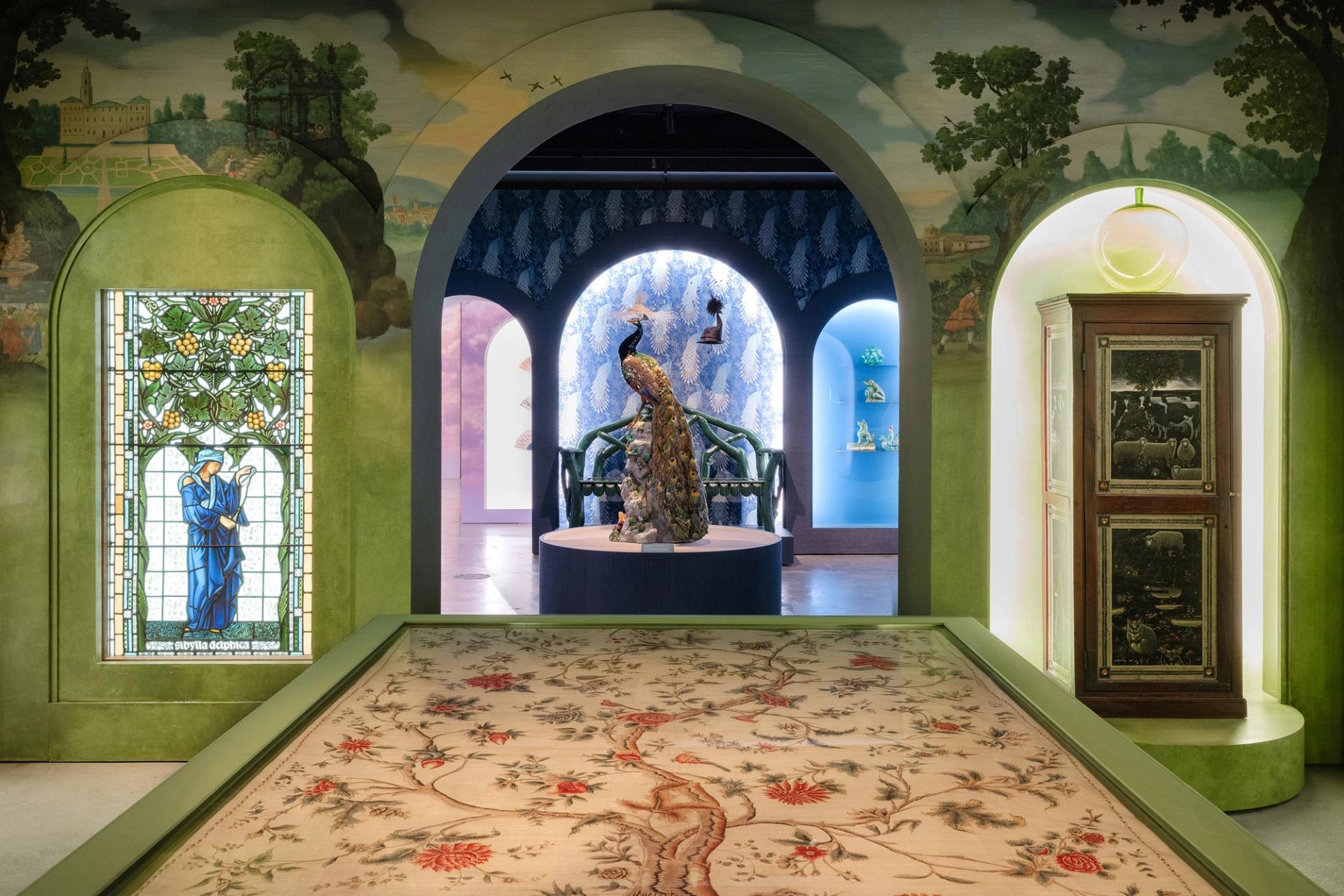 Arches in a room with eclectic collection items on display.