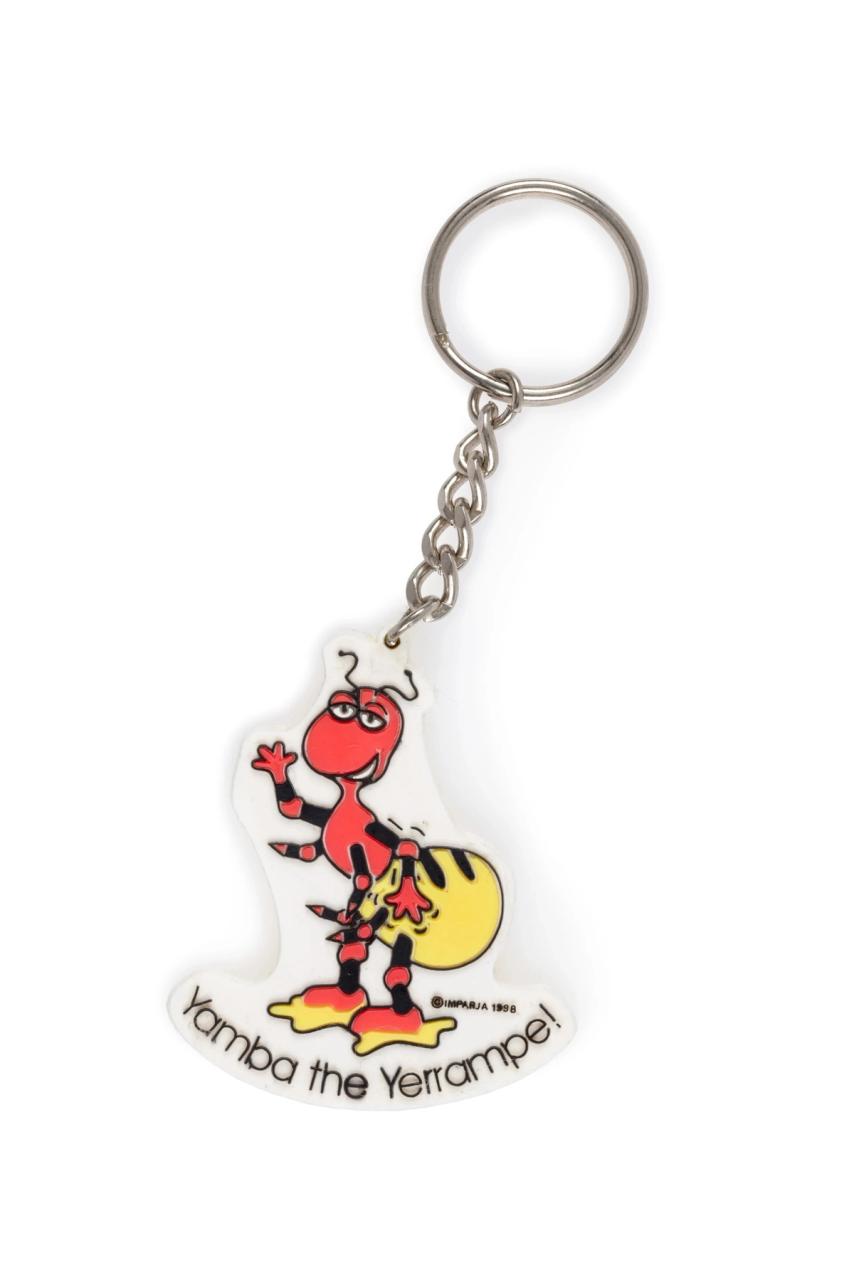 A small key ring with an illustration of a honey ant. 'Yamba the Yerrampe!' is below the red, black and yellow illustration.