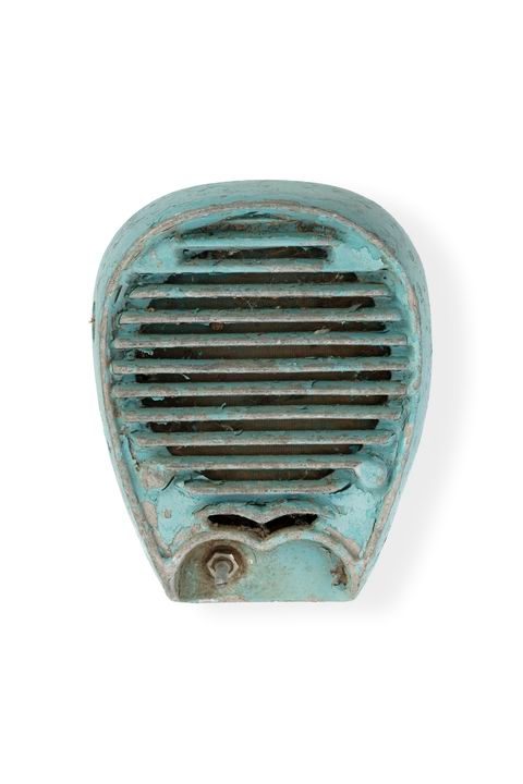 Metal casing painted blue, the casing has rounded edges and a circular grill at the front to allow sound to escape.