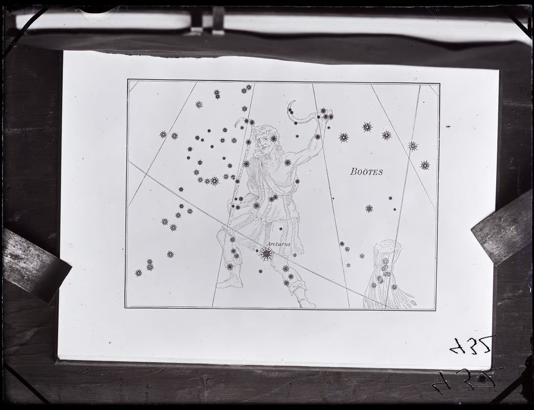 Stars with a drawing of a person amongst the stars.