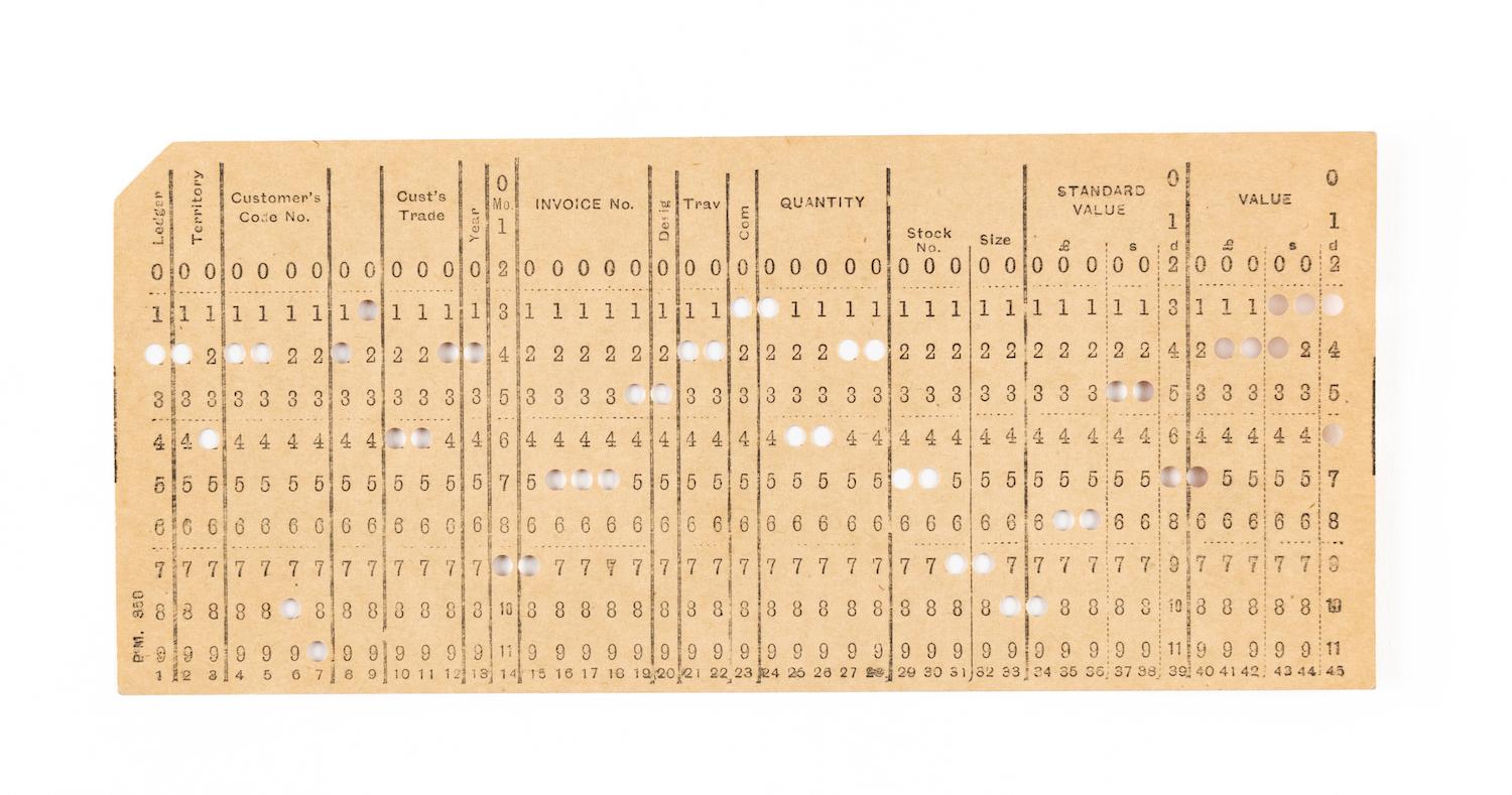 Punch card with numbers and punch holes