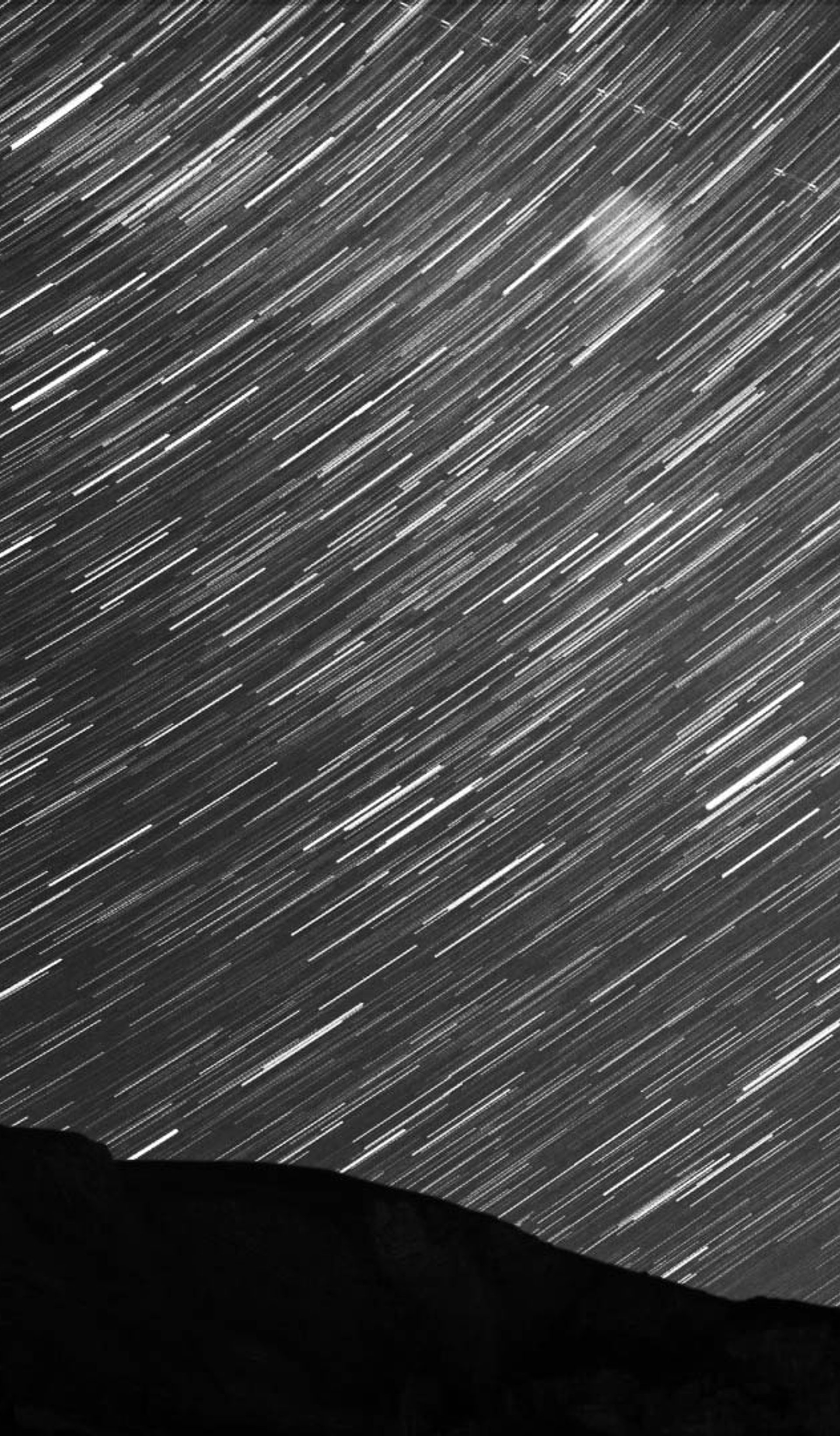Mountains with star trail.