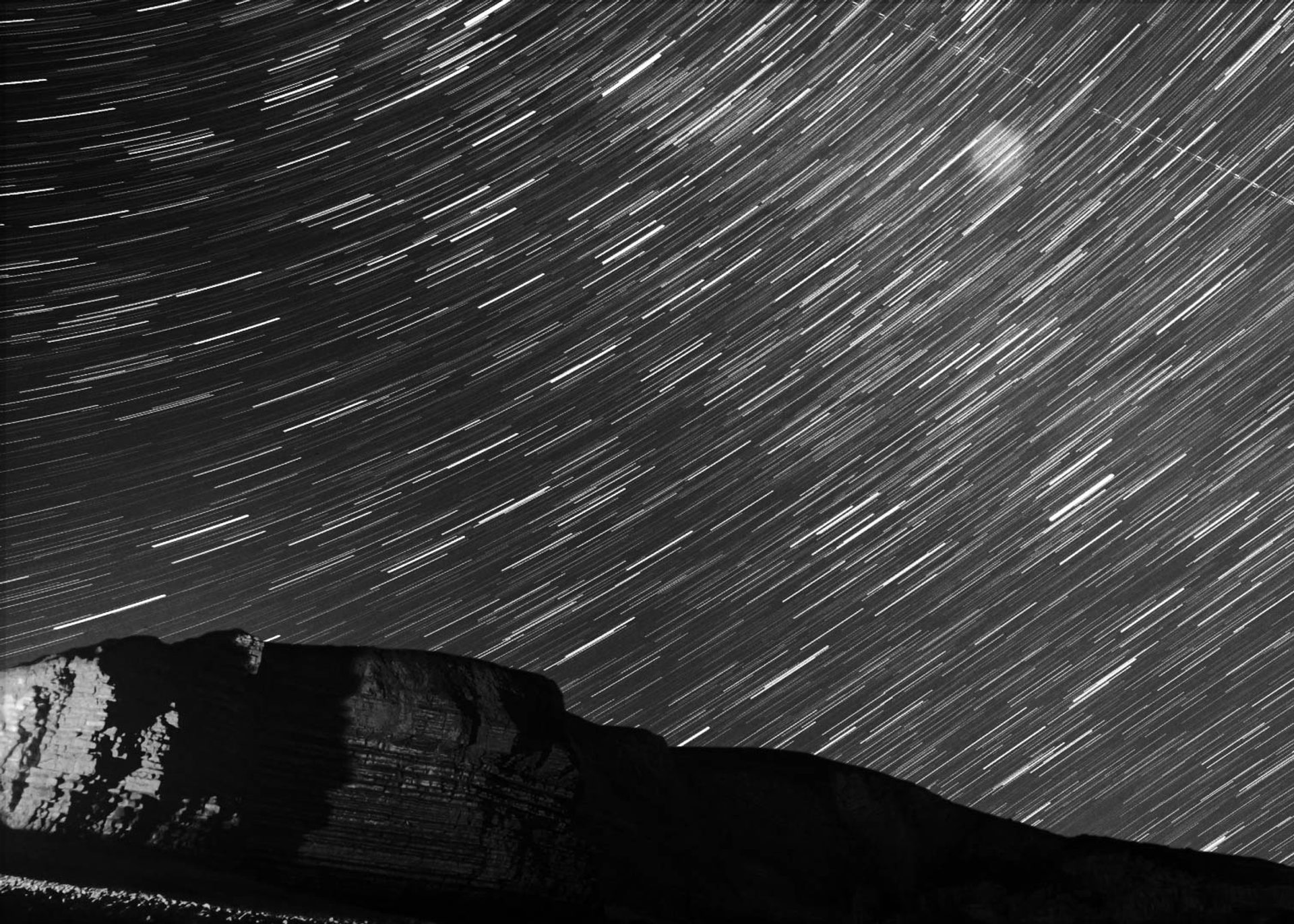 Mountains with star trail.