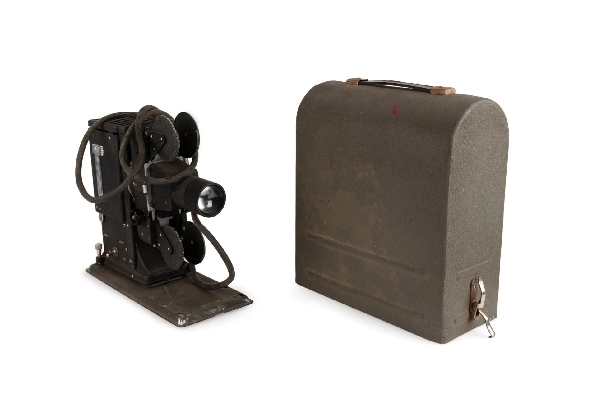 Photograph of a film and slide projector, beside is it's brown leather case.