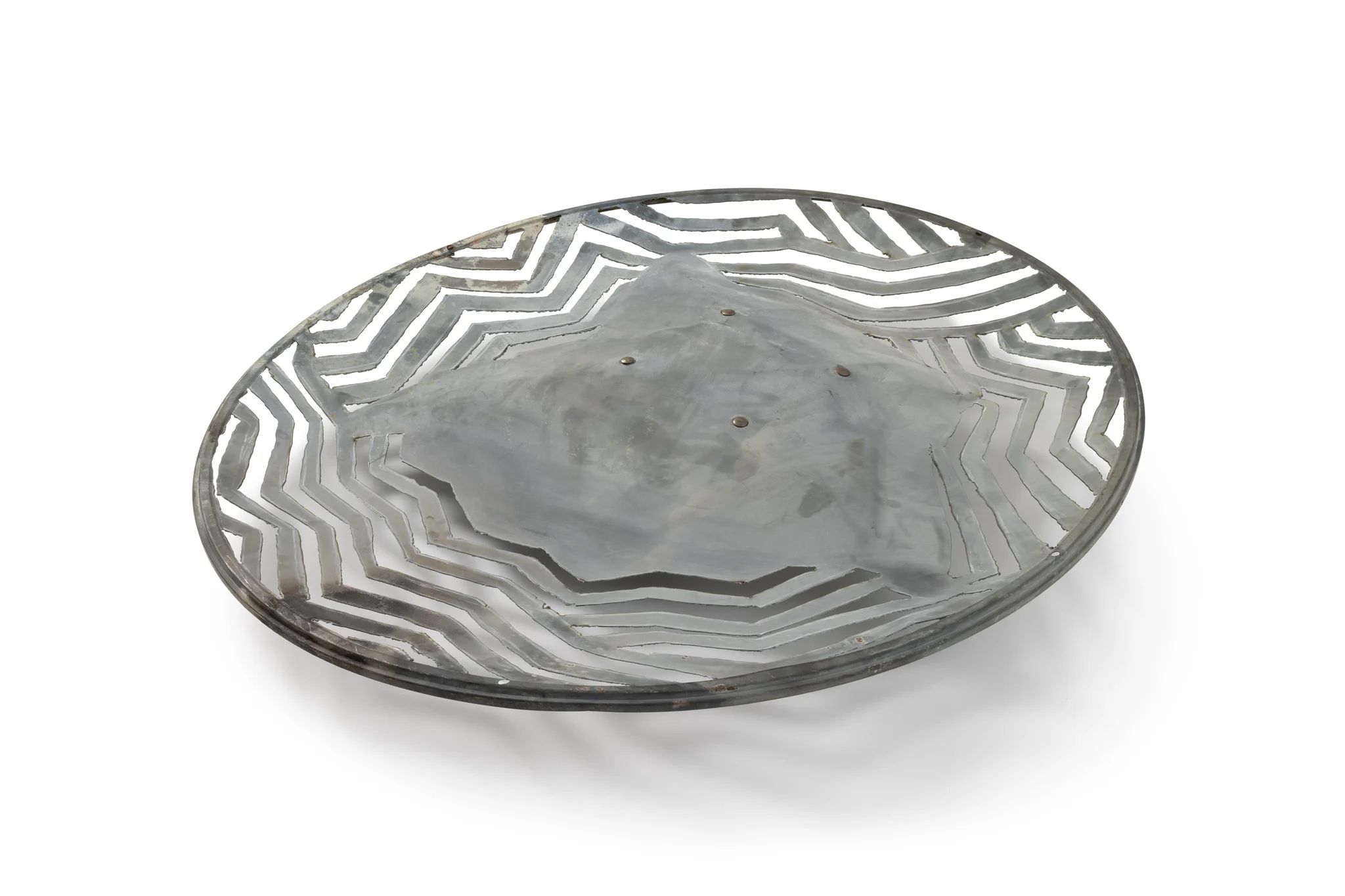 Satellite dish made out of patterned metal.