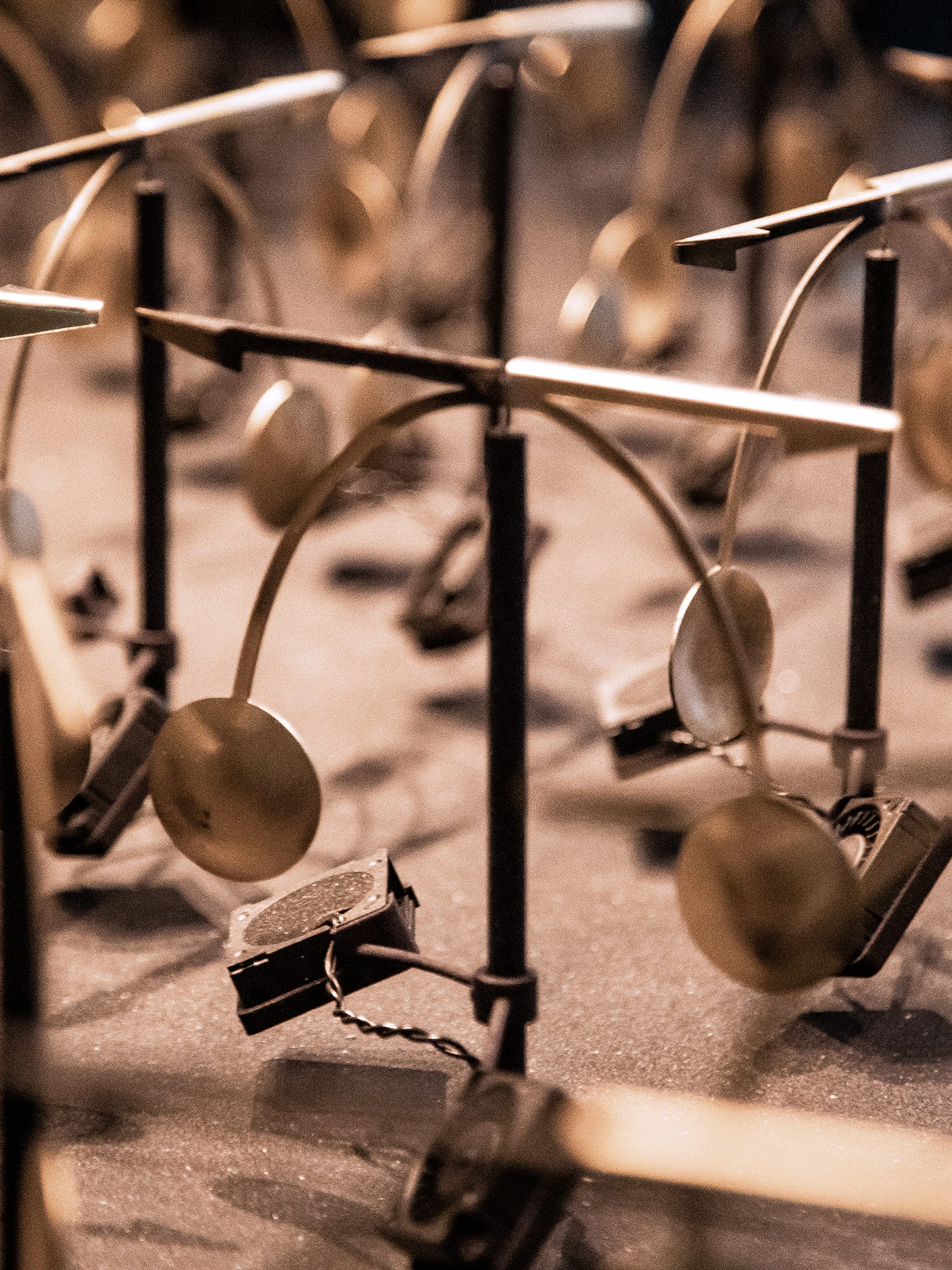 Small, gold weather vanes on display