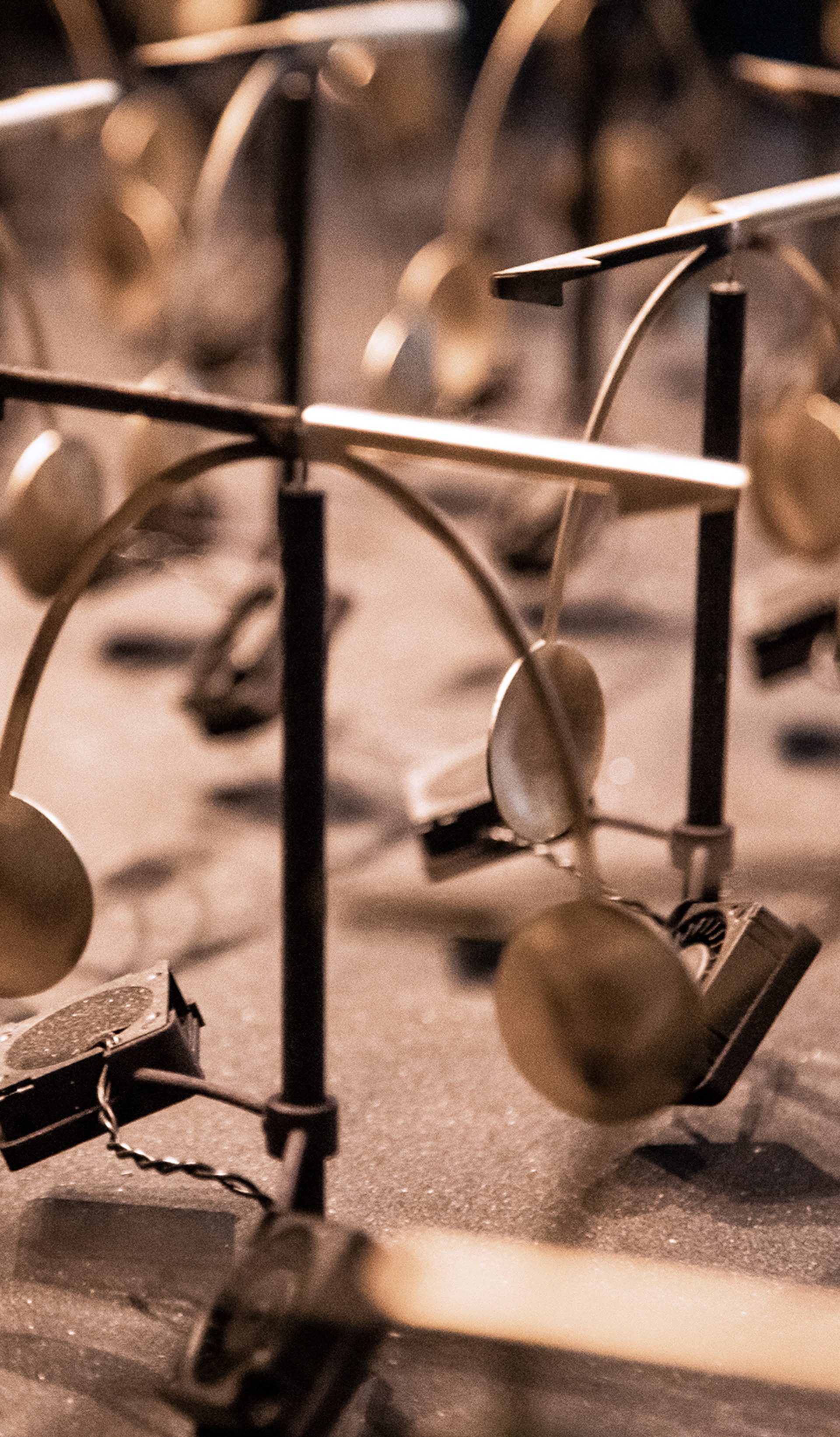 Small, gold weather vanes on display