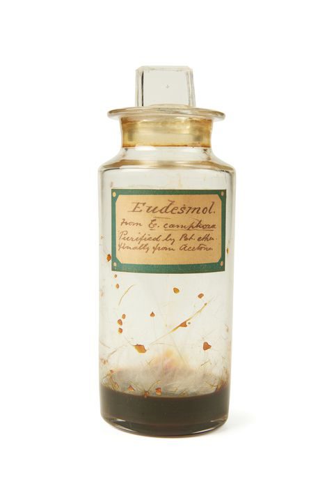 Eudesmol from the leaf-oil of Eucalyptus camphora (this specimen has decomposed but some sublimed, hair-like crystals are visible). In a glass jar with a label reading ‘Eudesmol’.