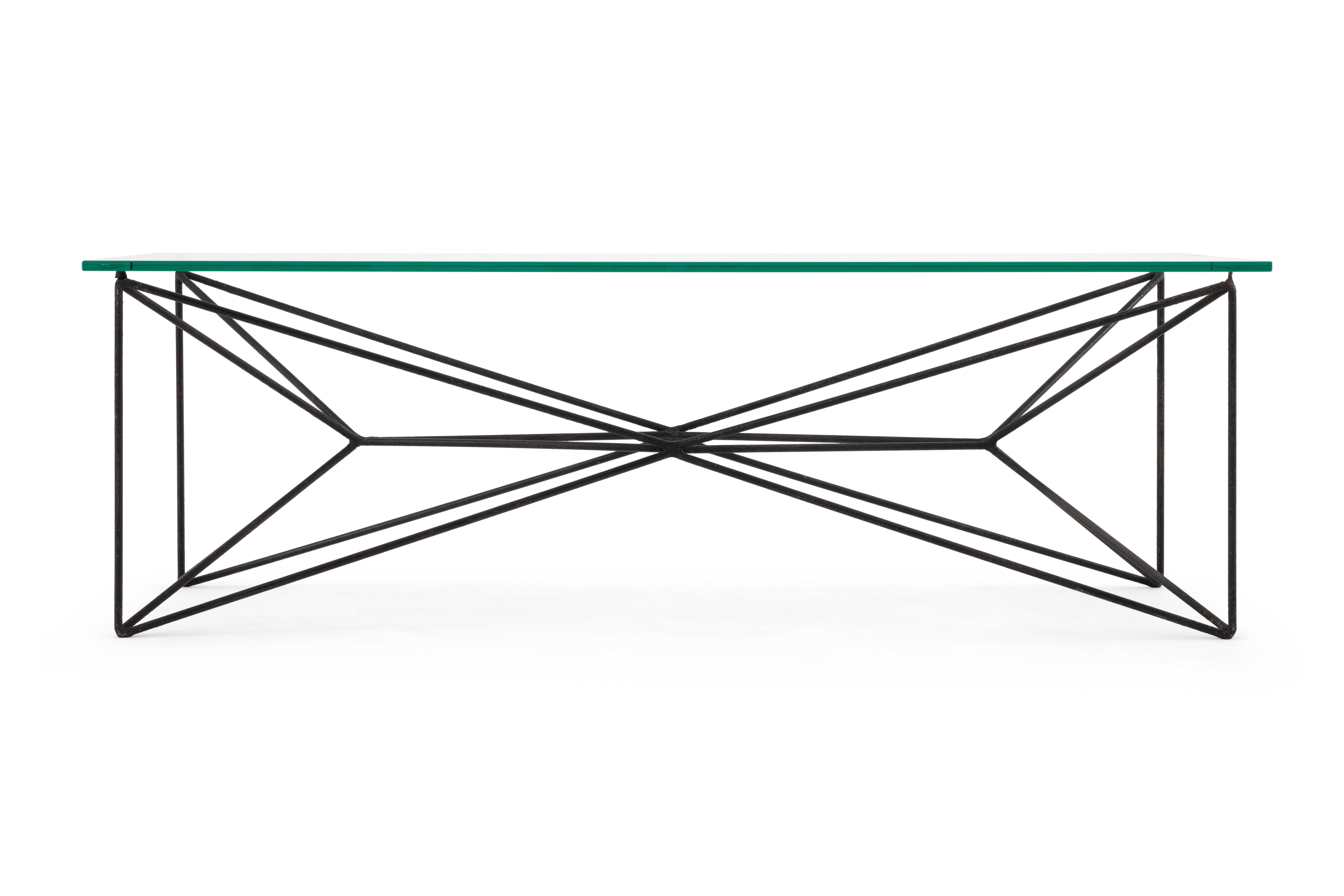 Coffee table with welded and bent steel rod and glass.