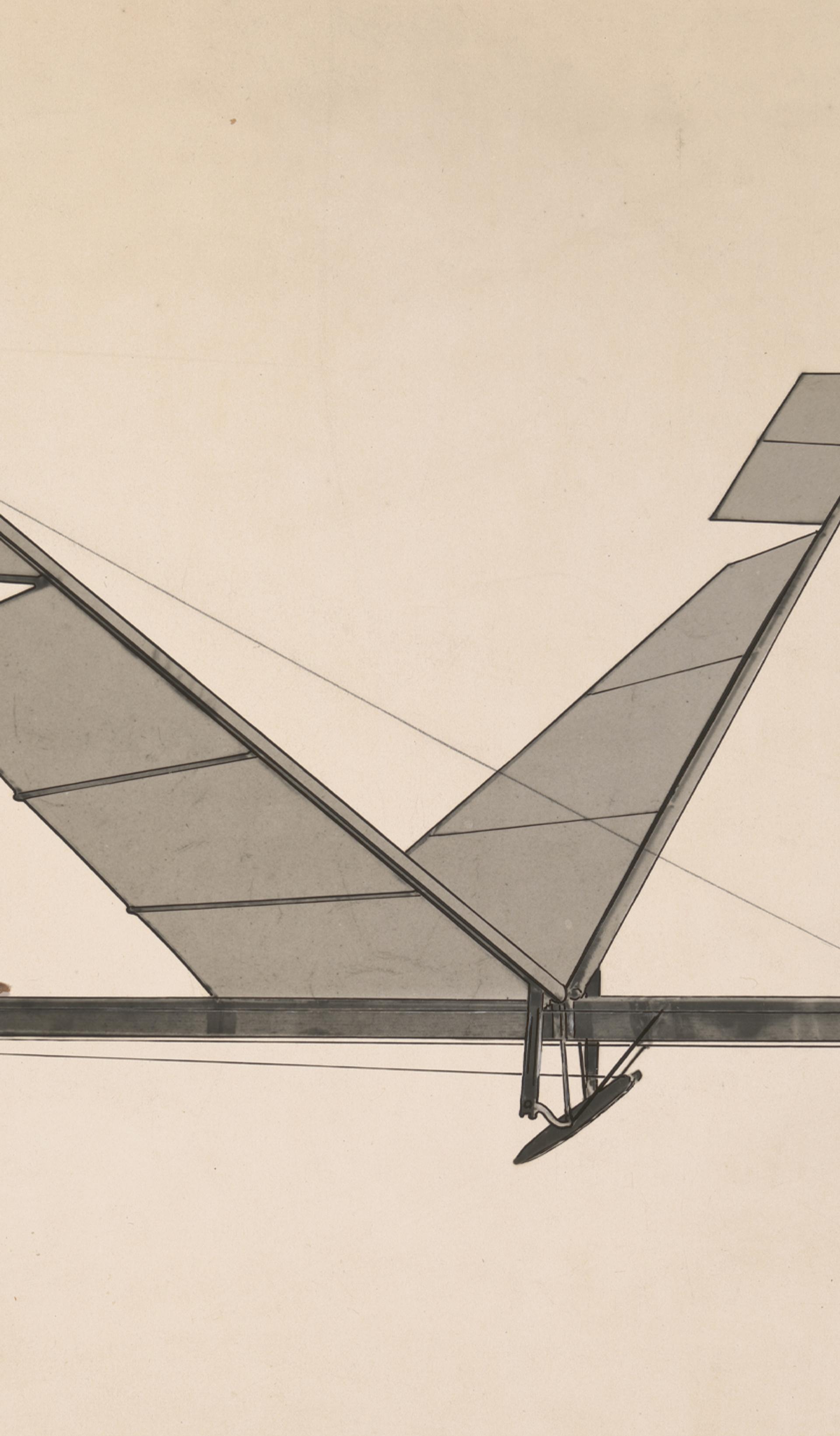 A black & white photograph depicting a rubber band flapping wing flying machine.