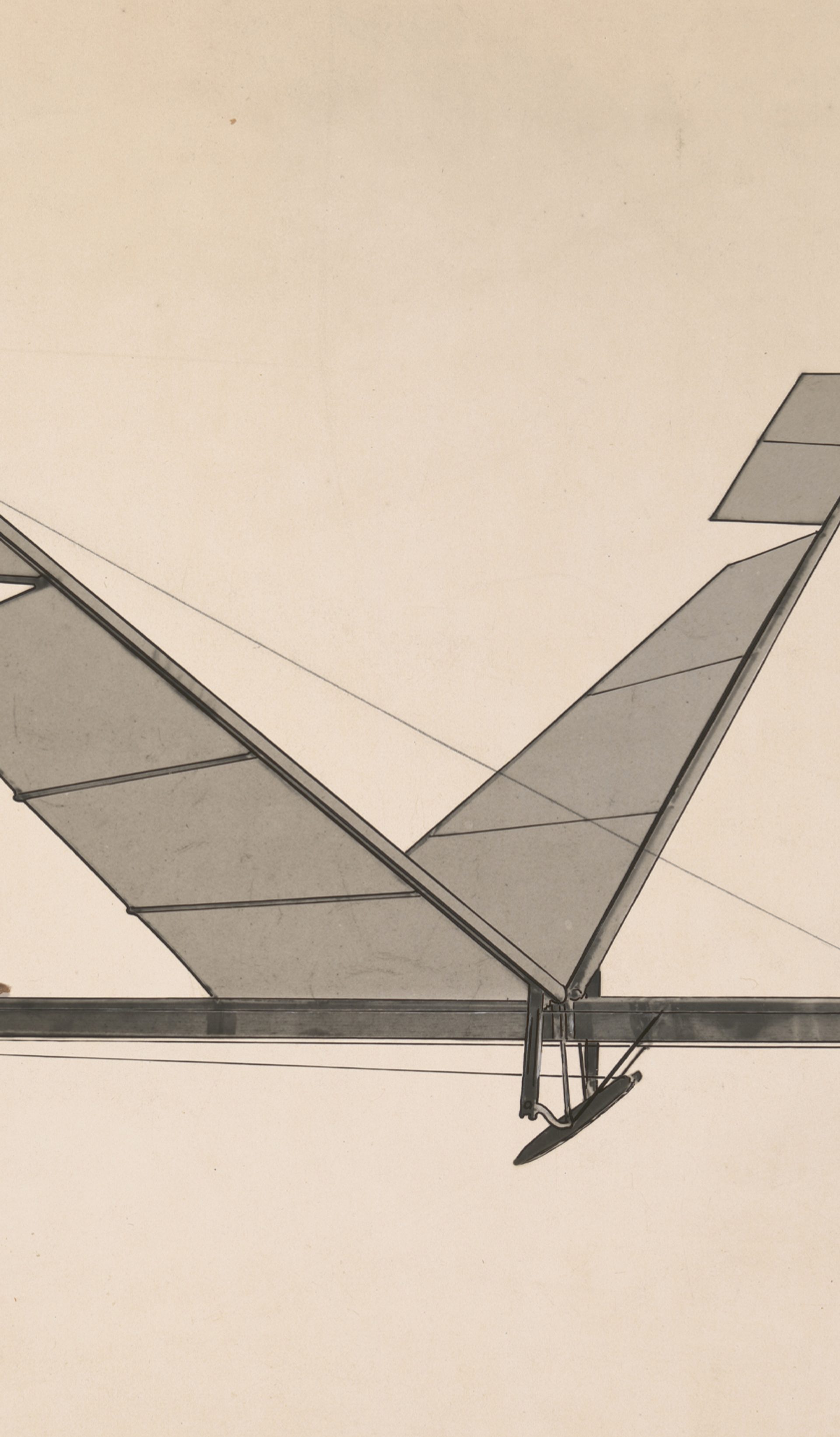 A black & white photograph depicting a rubber band flapping wing flying machine.