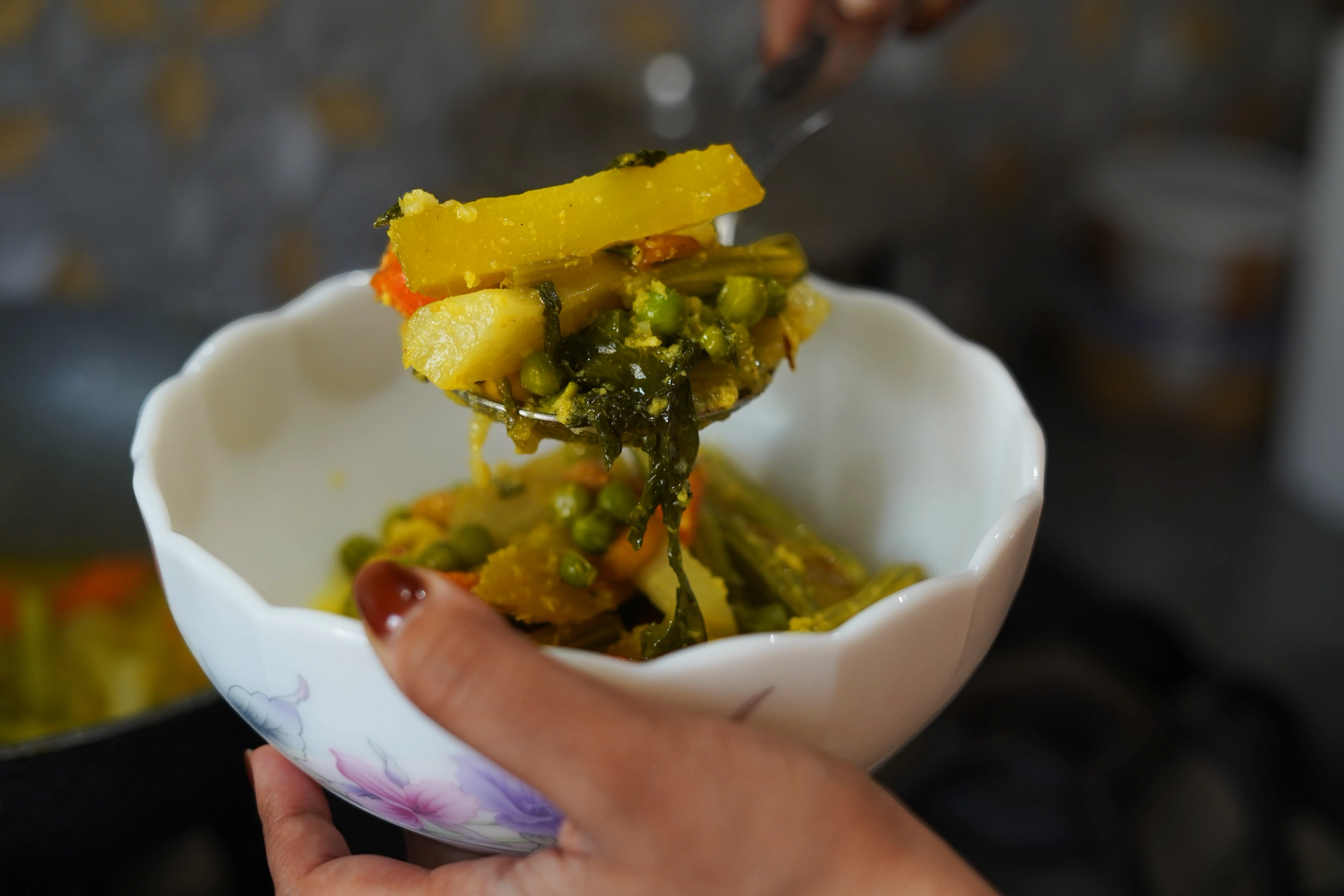 Vegetable stir-fry in a white bowl.