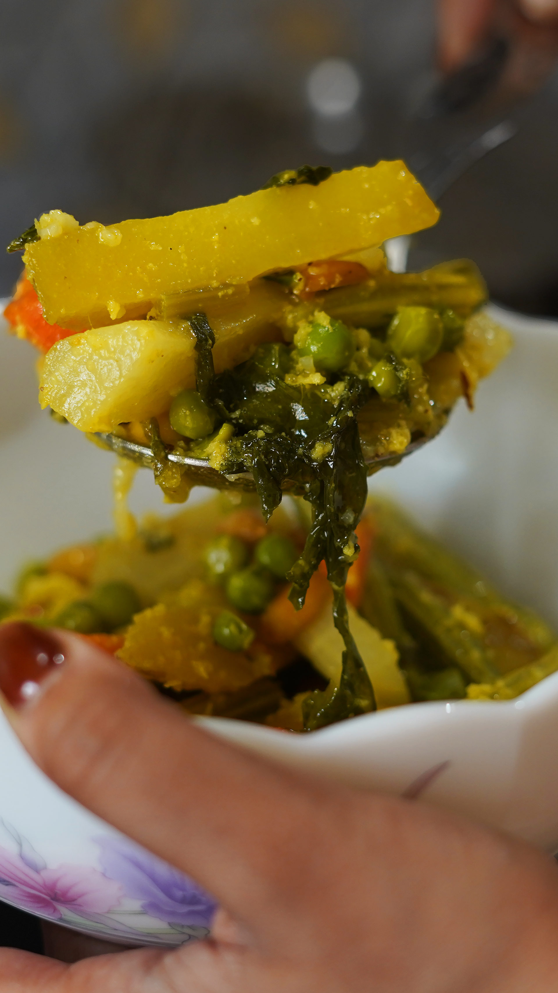 Vegetable stir-fry in a white bowl.