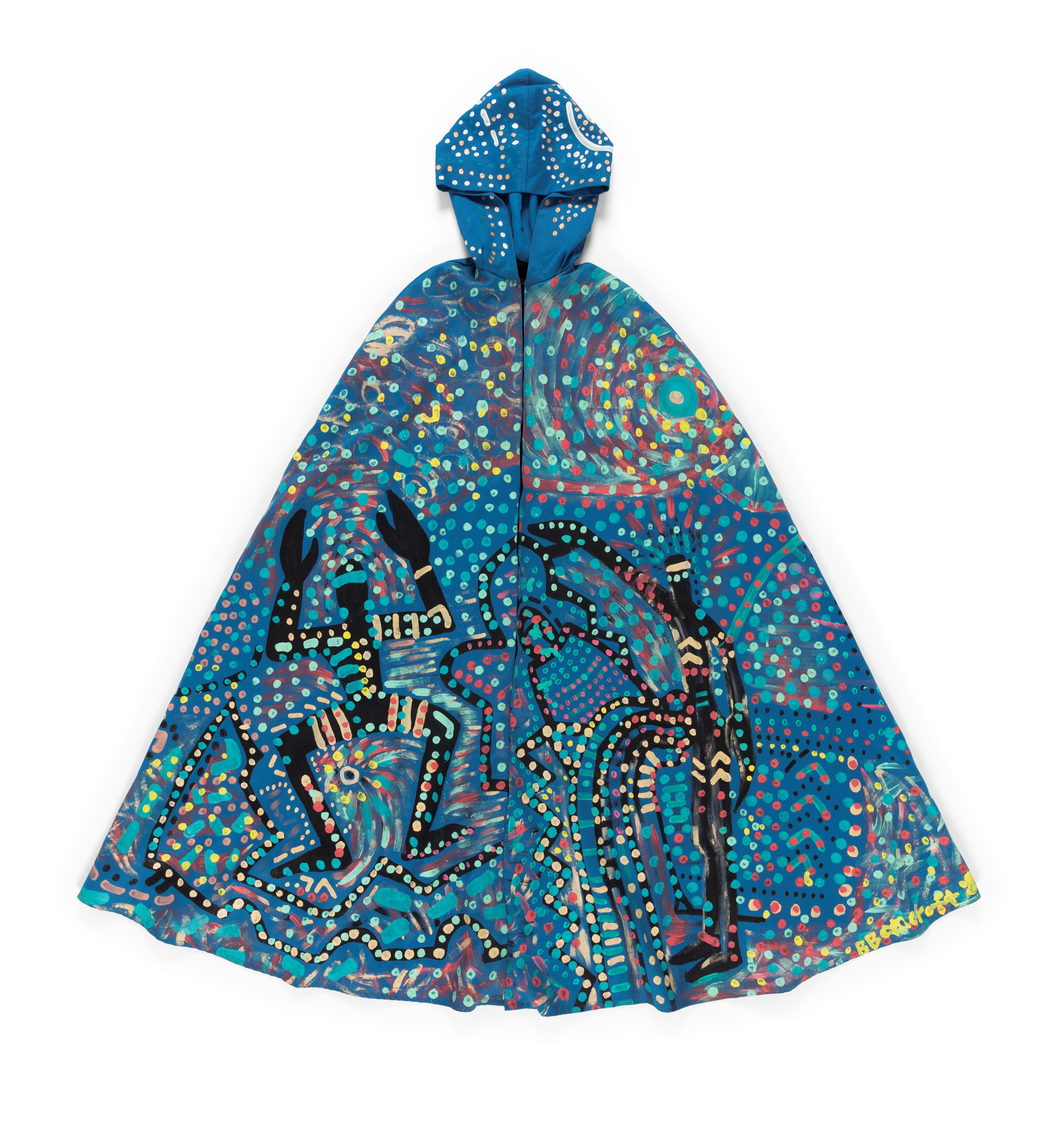 Full length opera cape with hood made of blue cotton drill lined with black polyester. Cape fastens at neck with centre front hook and eye fastening. Handpainted design using poster and fabric paint featuring two human figures on the front and a lizard on the back, representing the journey through life of an Aboriginal man and woman.