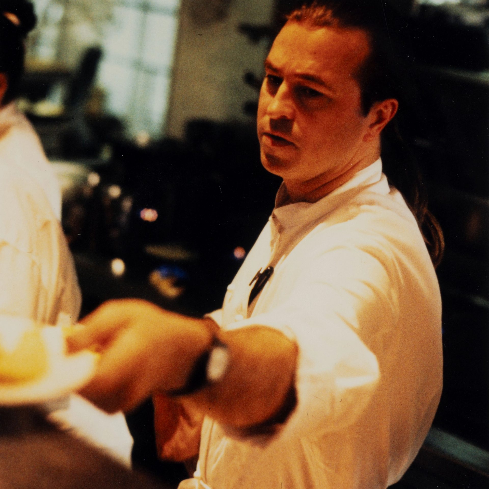 Neil Perry serving food.