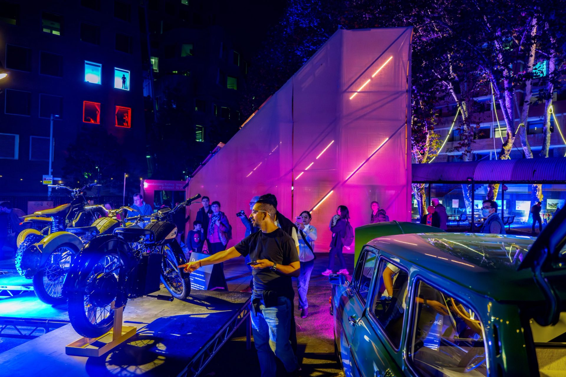 A display space outside lit up by cool tones.