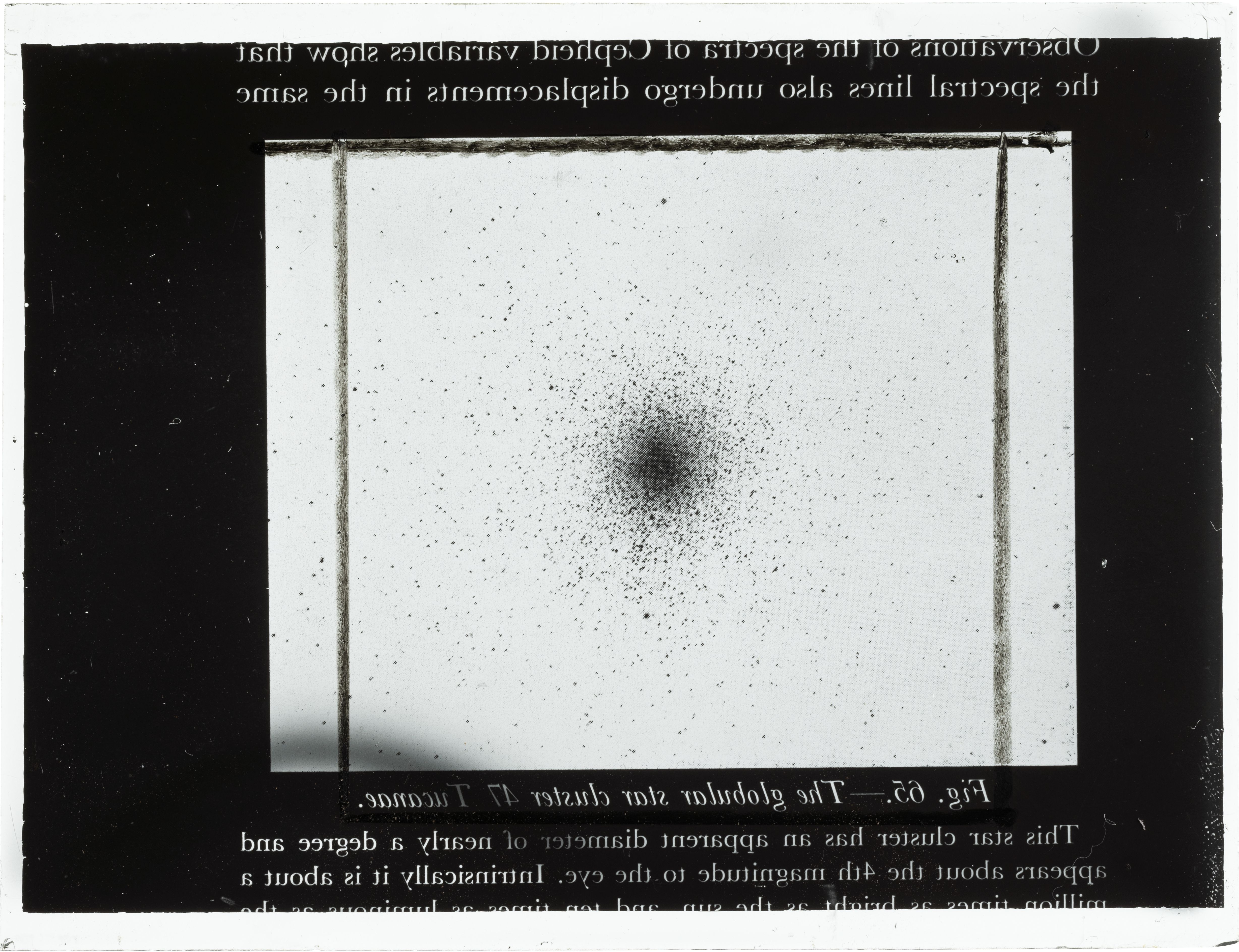An inverted image of a glass plate slide, showing an image of the globular star cluster, Tucanae, with text above and below the image.