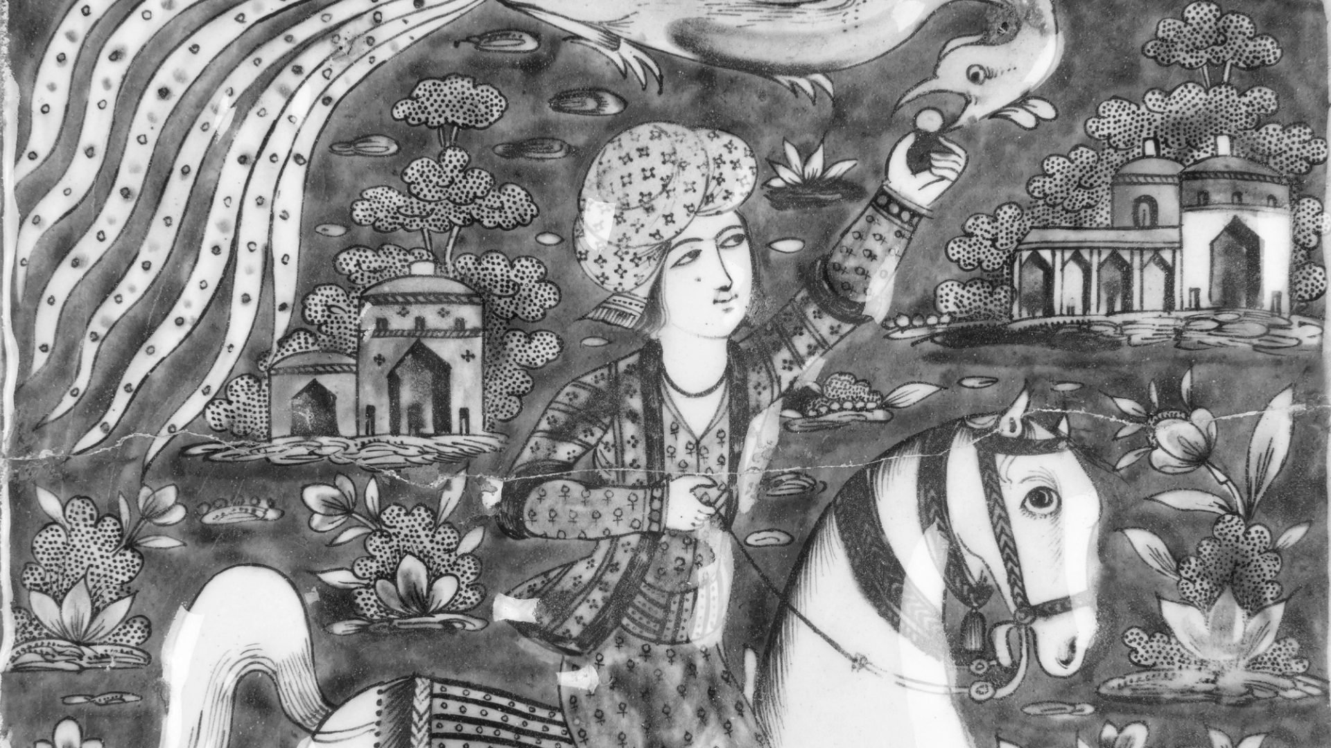 A rectangular glazed tile is painted in cobalt-blue, turquoise, manganese and pink with a black outline on a white ground and was made for the decoration of the wall of an internal reception hall, the external wall of a castle or the house of an aristocratic Qajar family.