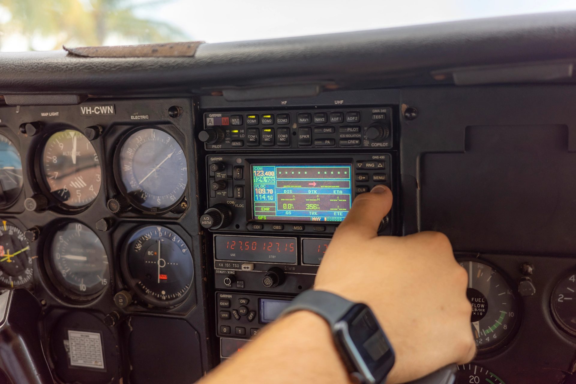 A closeup of a small plane’s dashboard/flight instruments.