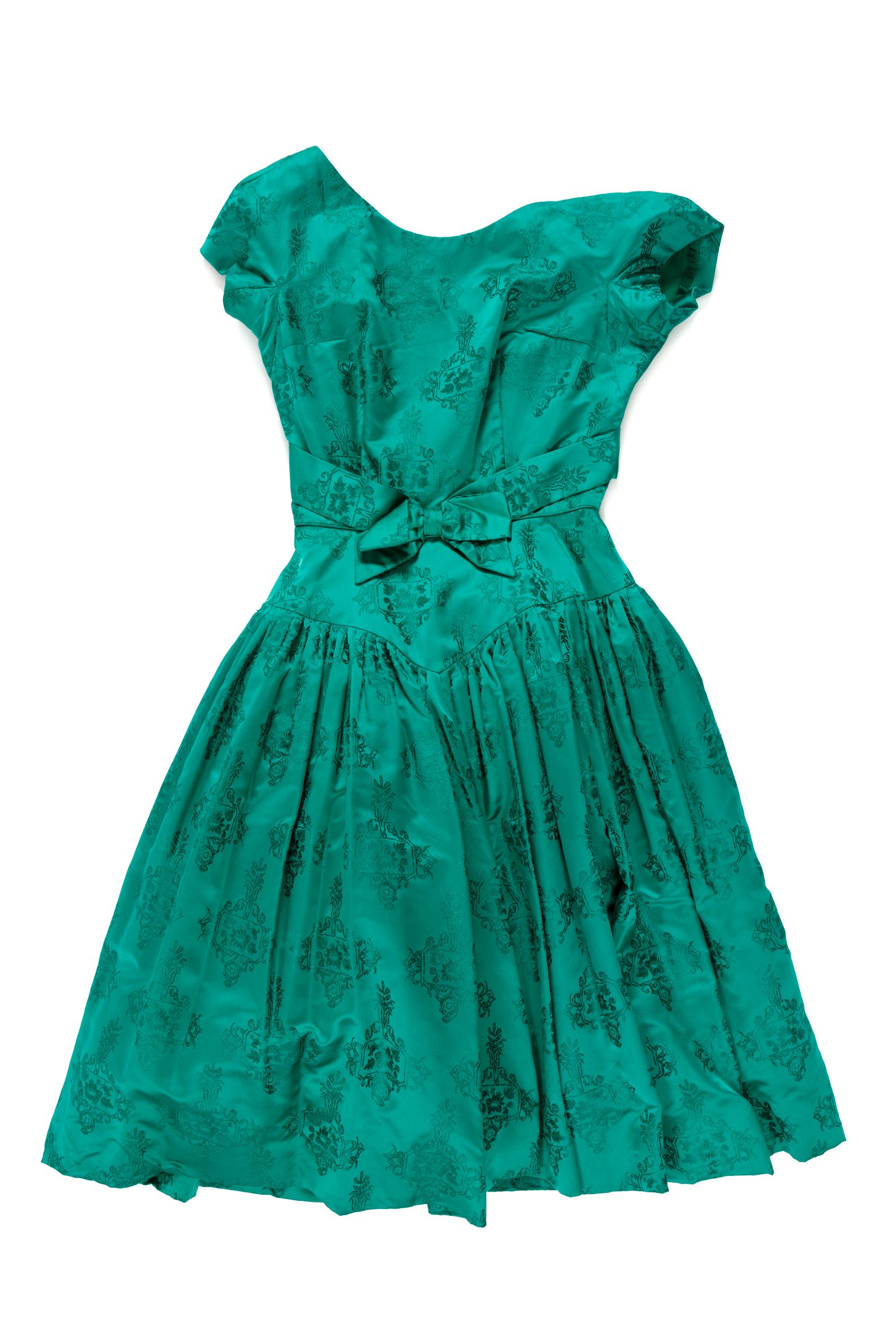 Emerald green brocaded silk cocktail dress with a round neckline at front.
