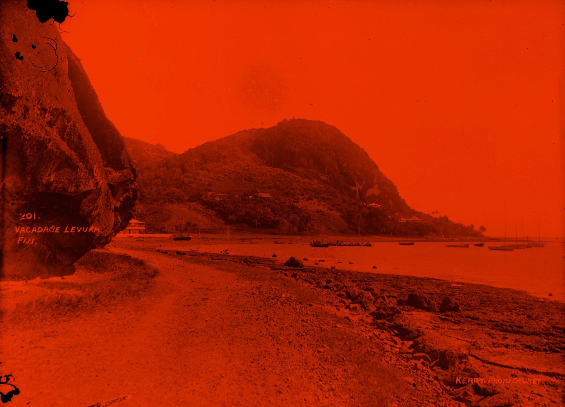 A beach landscape bending around a rock