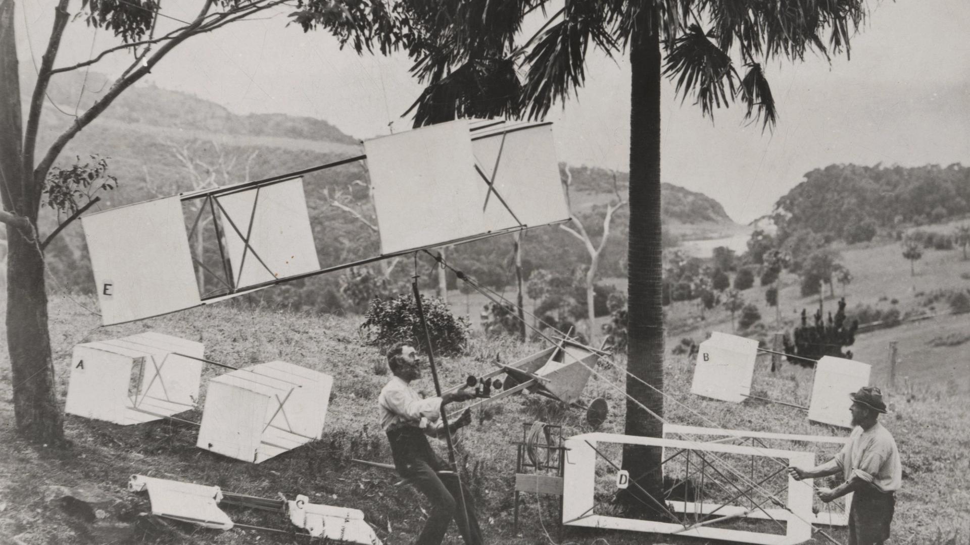 many kites within a country landscape