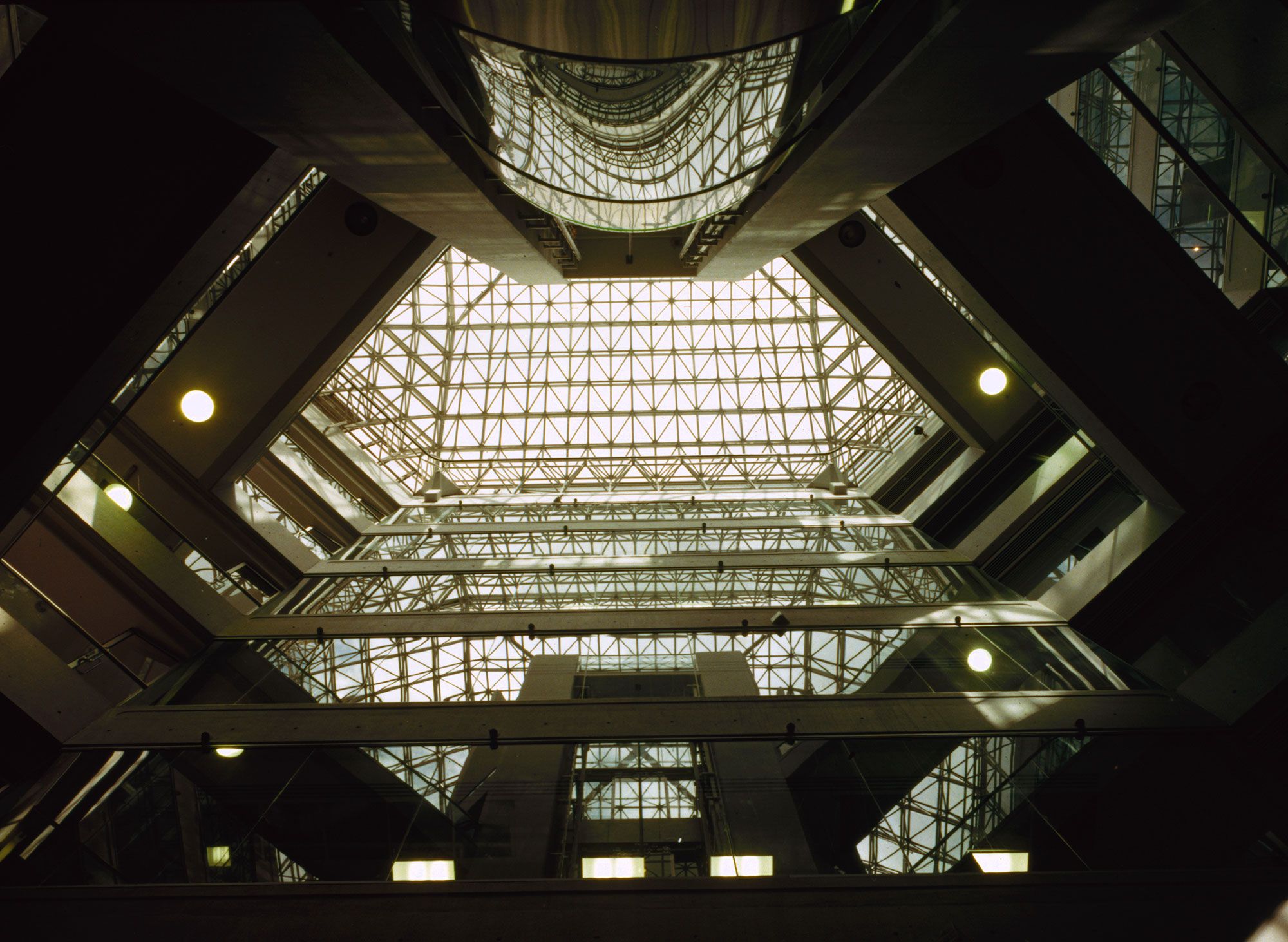 Inside view of a multi-level octagonal glass office building.