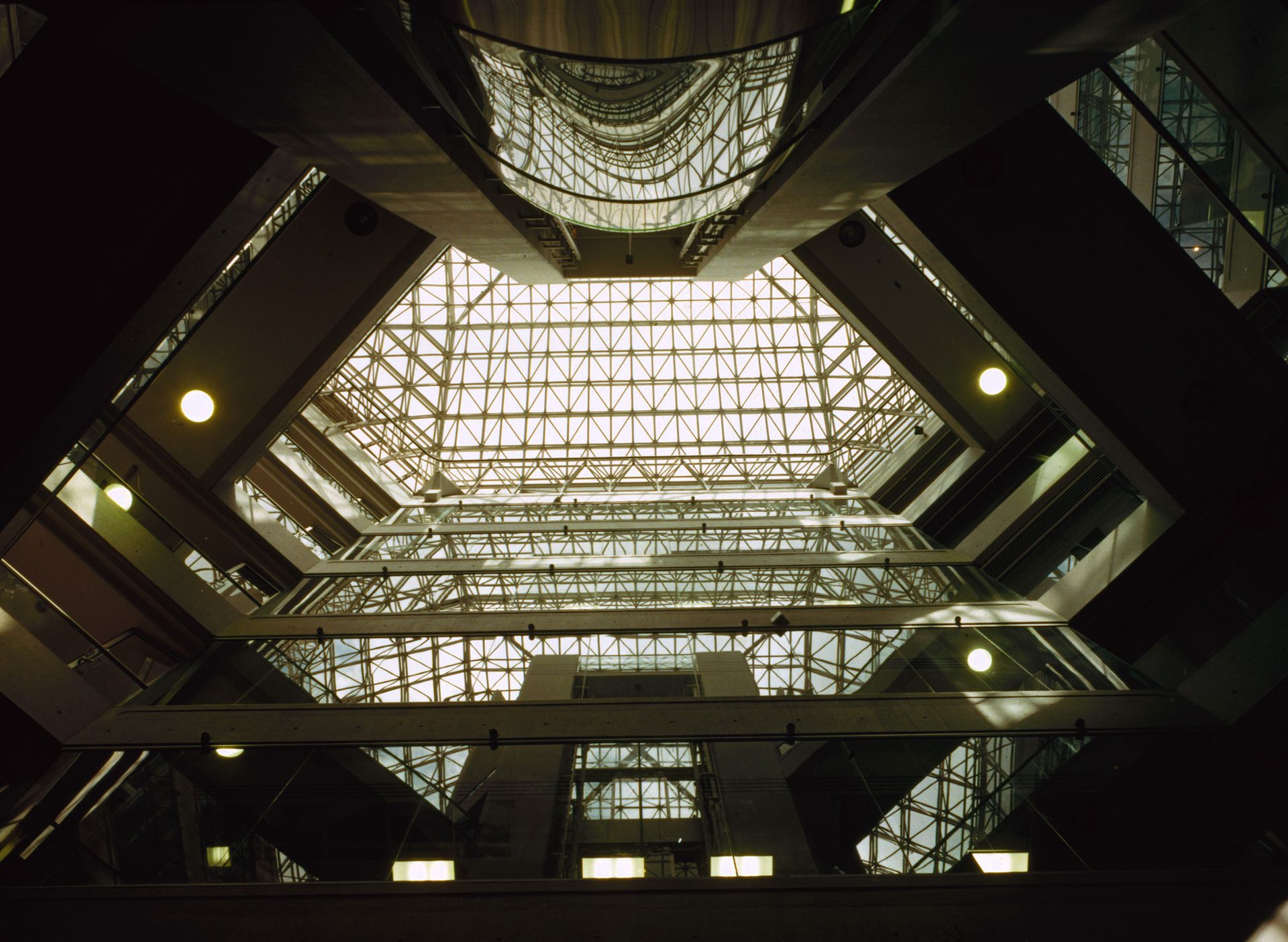 Inside view of a multi-level octagonal glass office building.