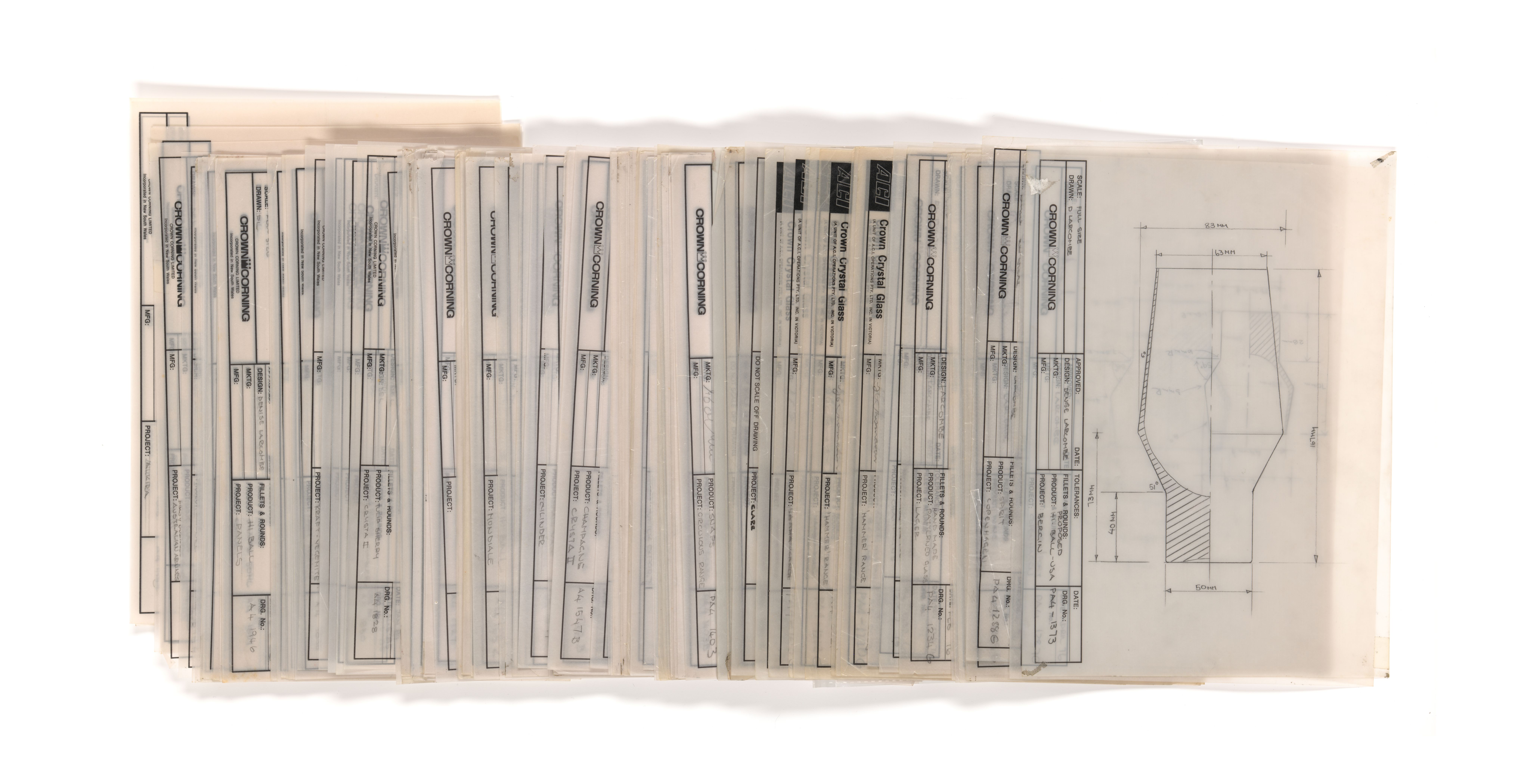 A row of scattered technical drawings of glassware designs and concepts.