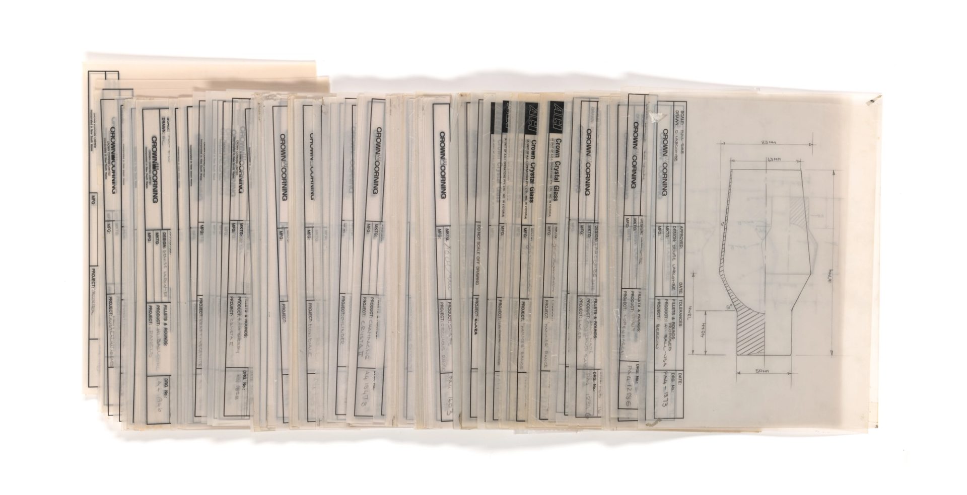 A row of scattered technical drawings of glassware designs and concepts.