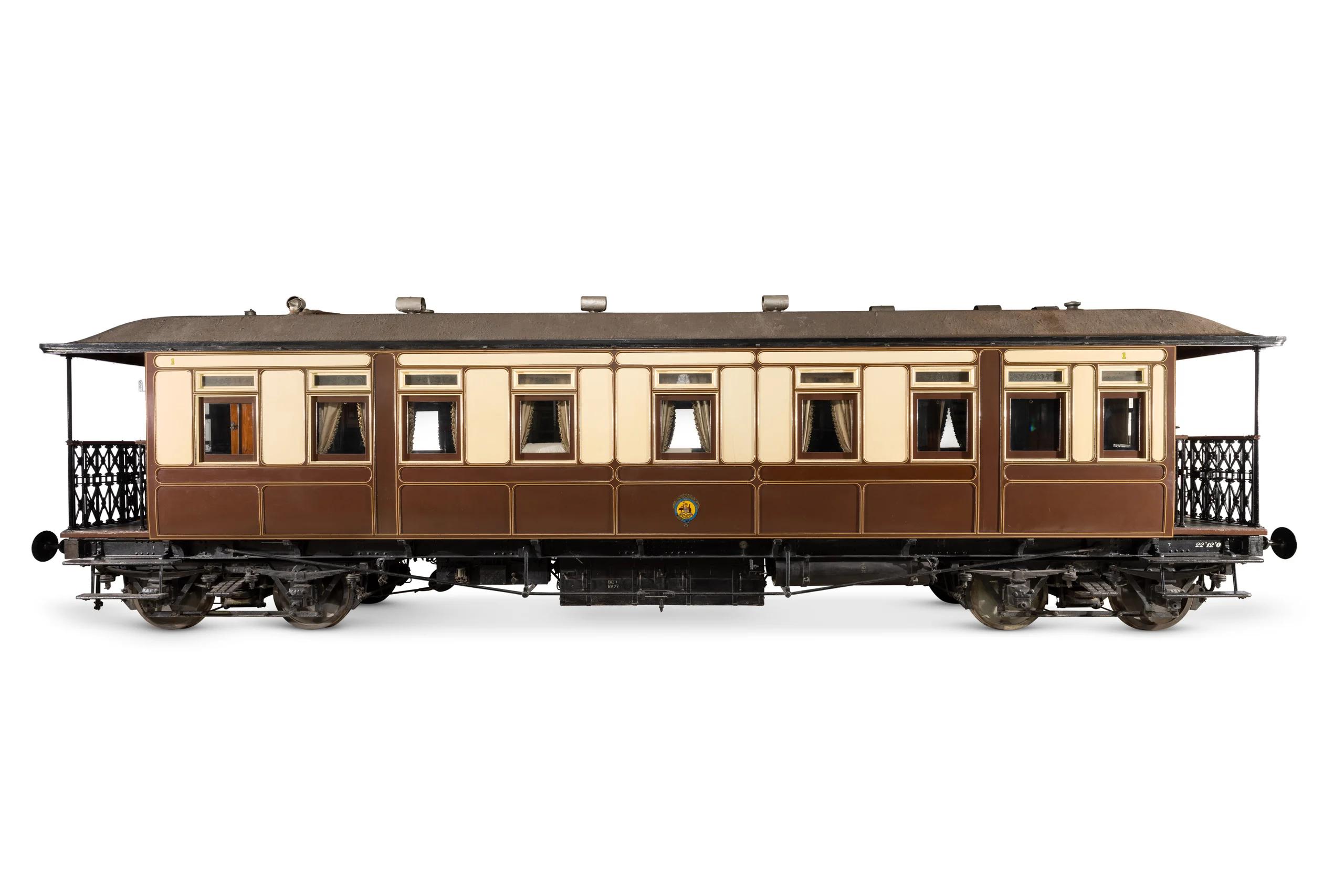 Photograph of a brown and cream railway carriage