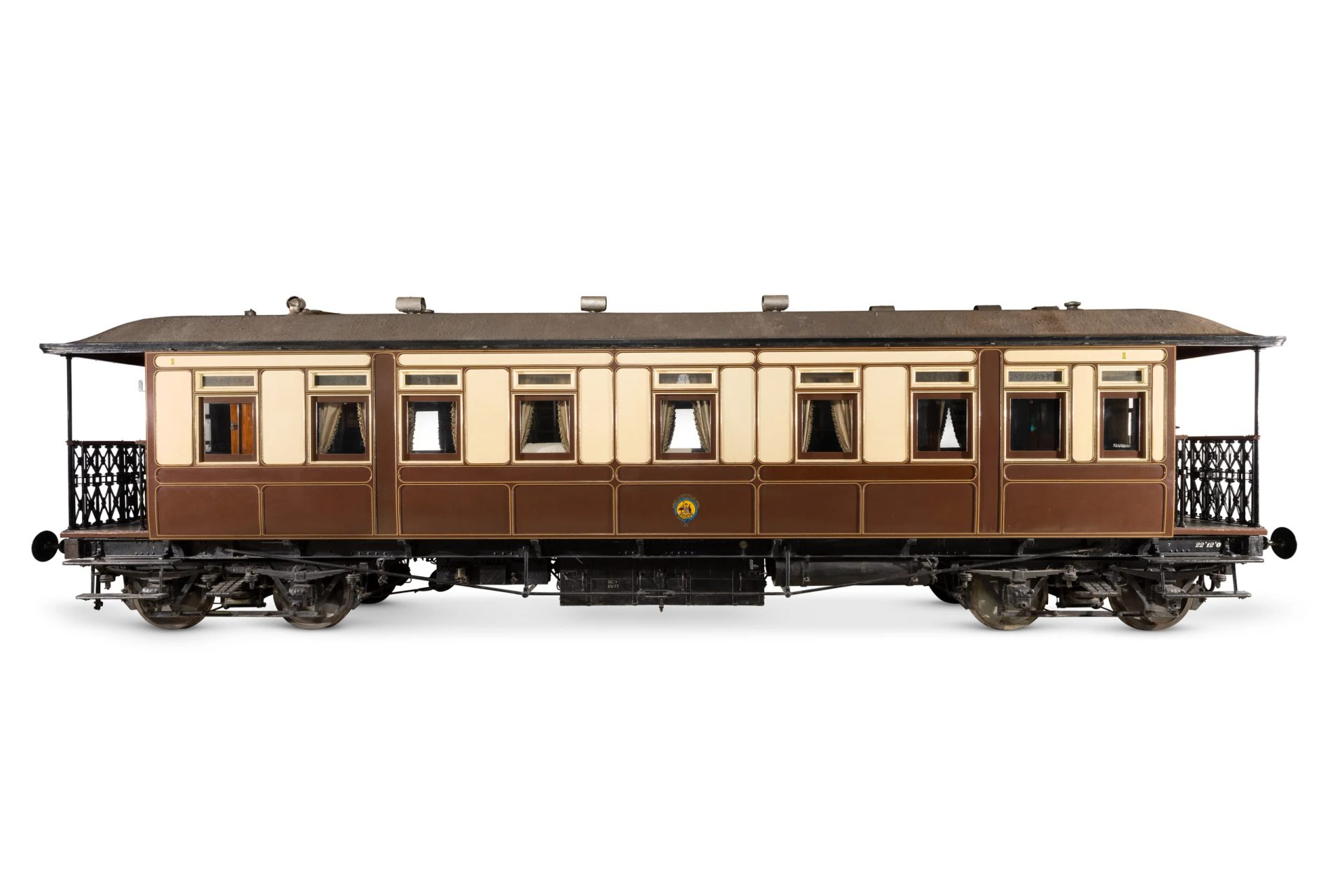 Photograph of a brown and cream railway carriage