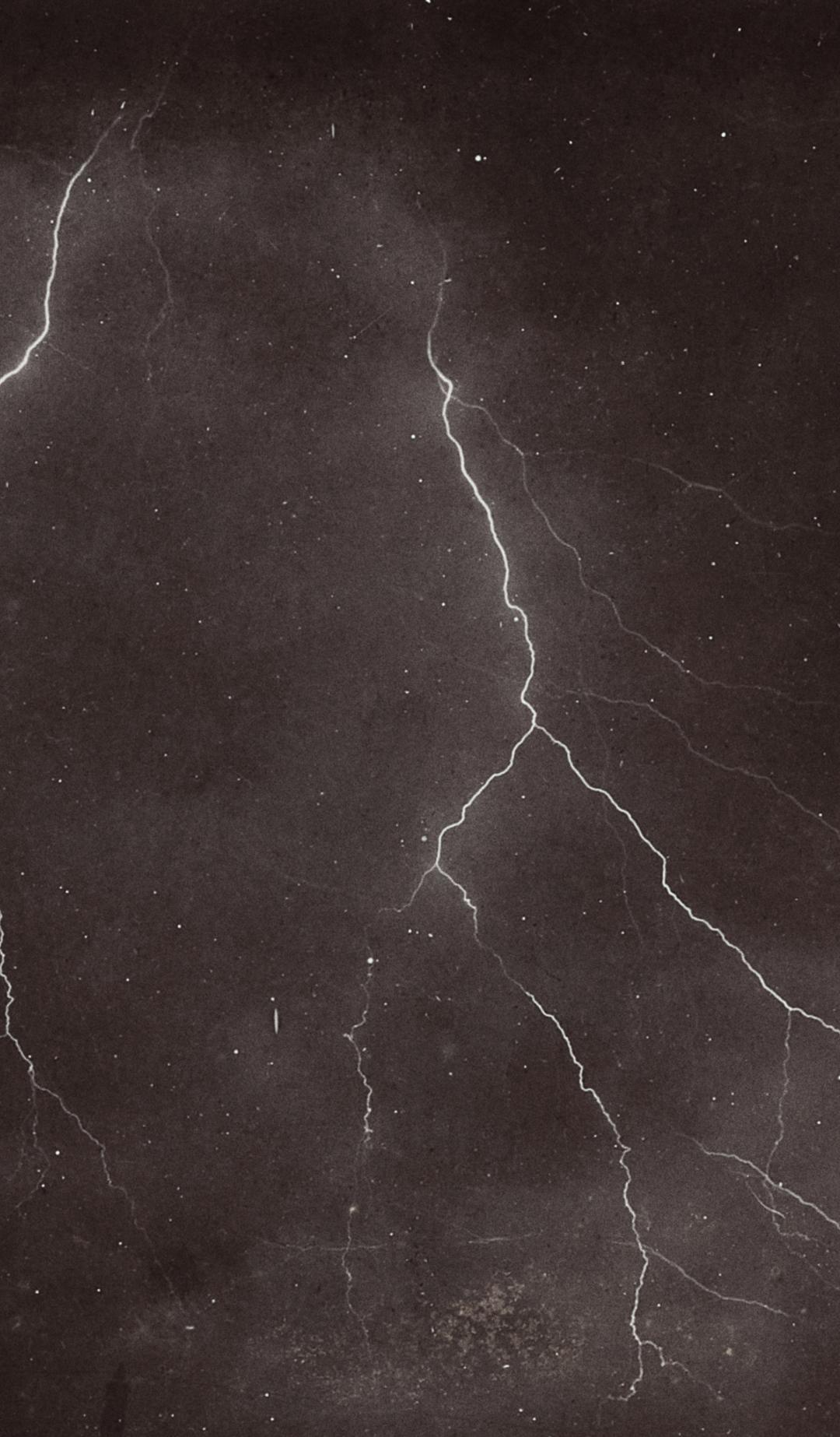 two lightning bolts in the night sky