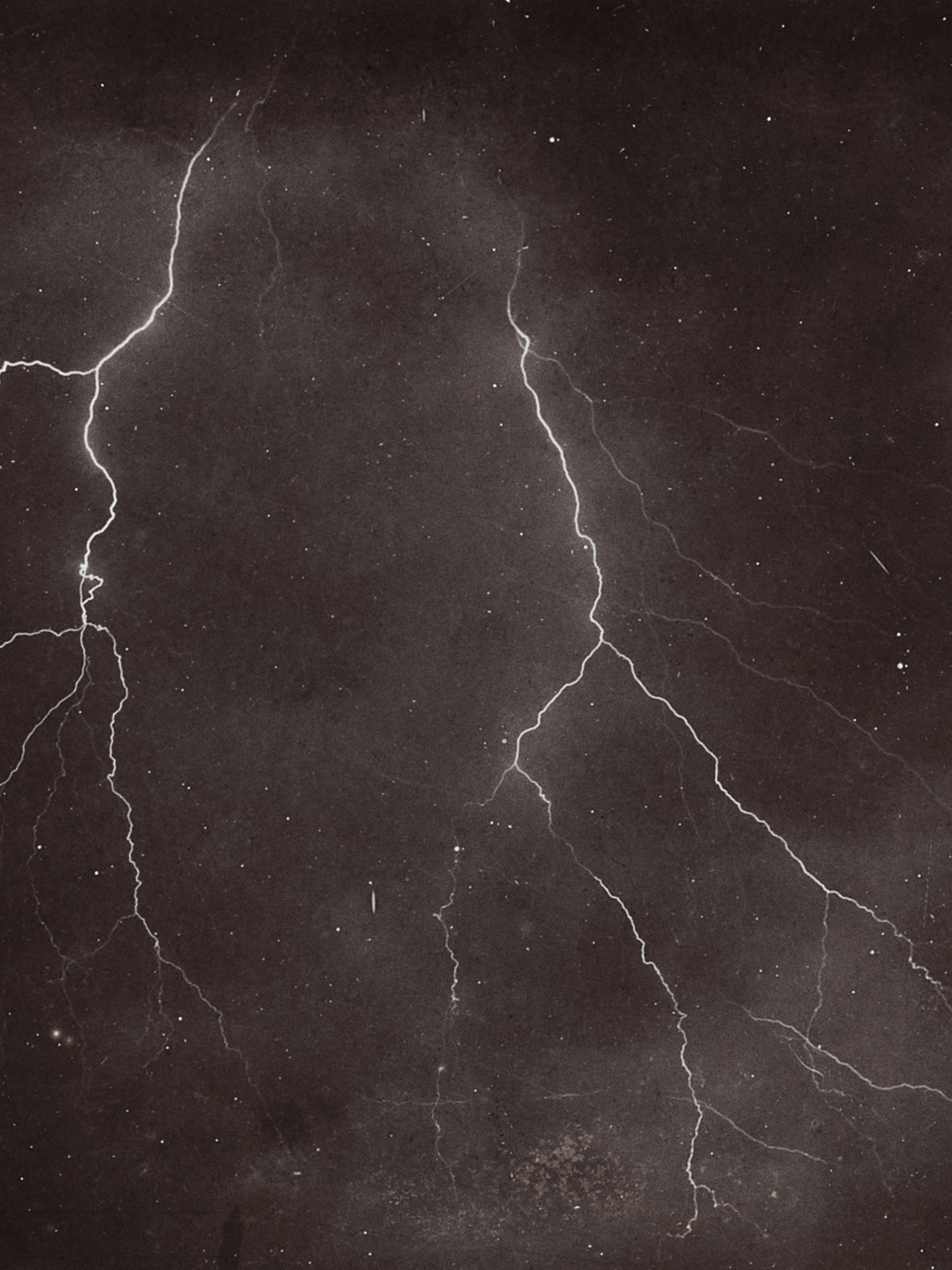two lightning bolts in the night sky