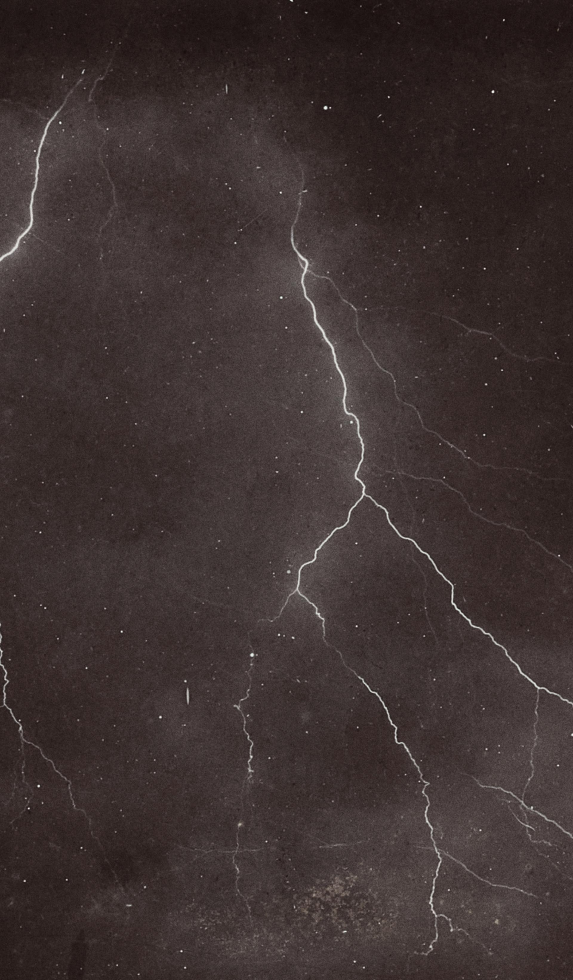 two lightning bolts in the night sky