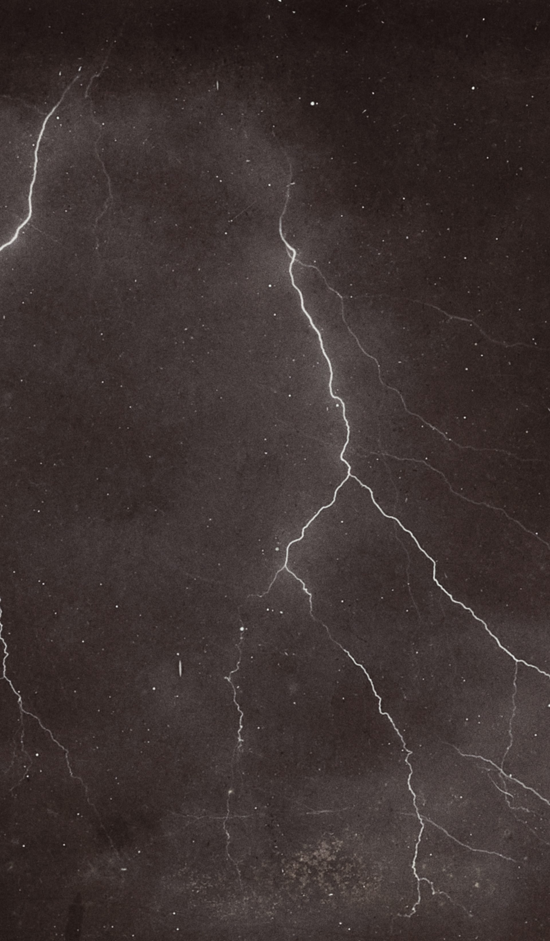 two lightning bolts in the night sky