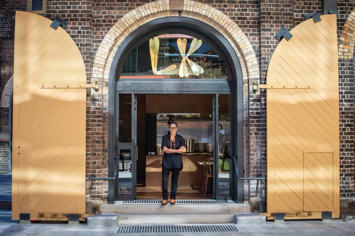 Kylie Kwong stands confidently at the entrance of Lucky Kwong.