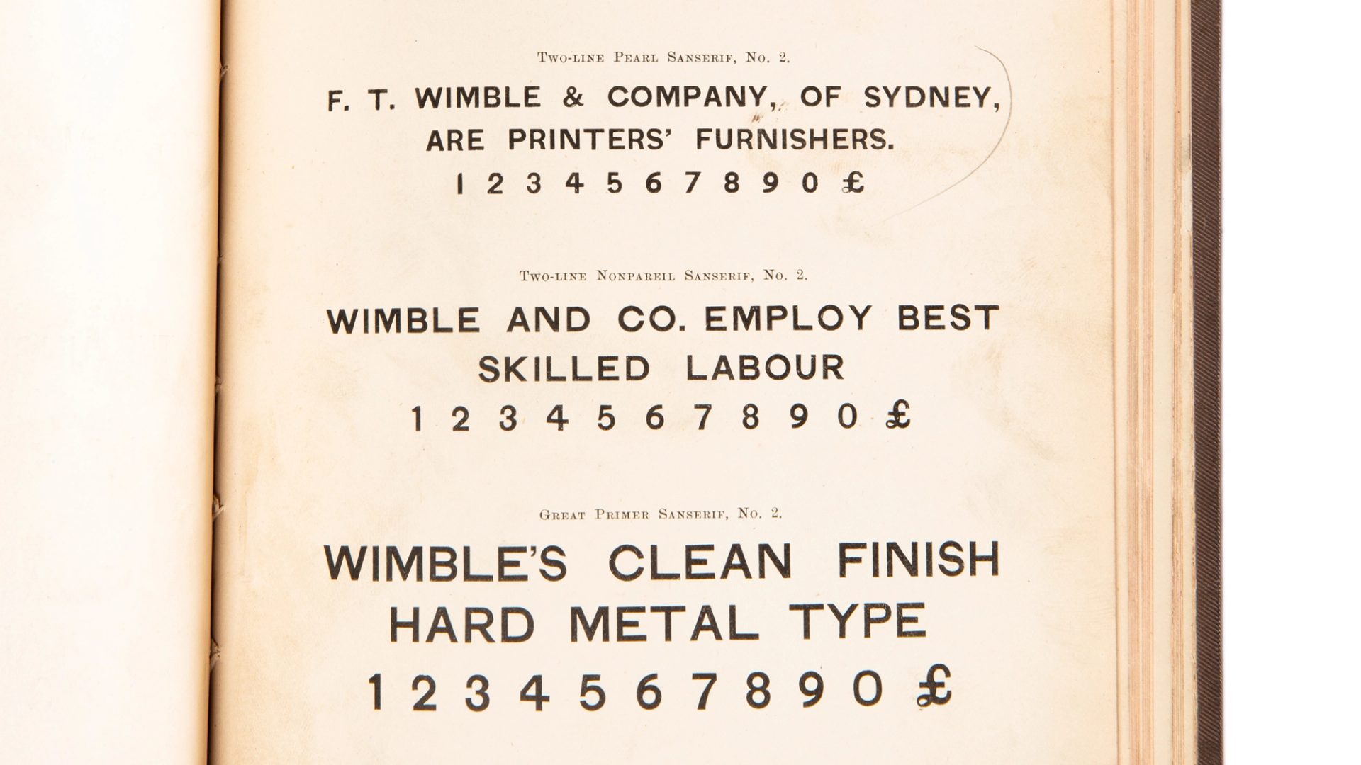 Close up of a book page featuring lines of text and numbers.