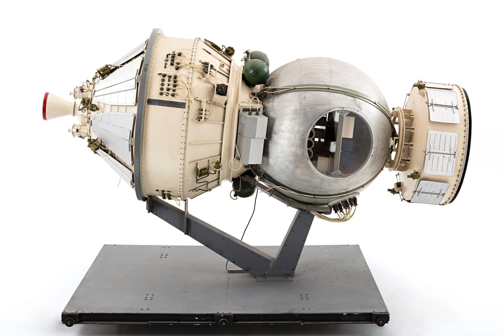 Cream and silver model of a satellite