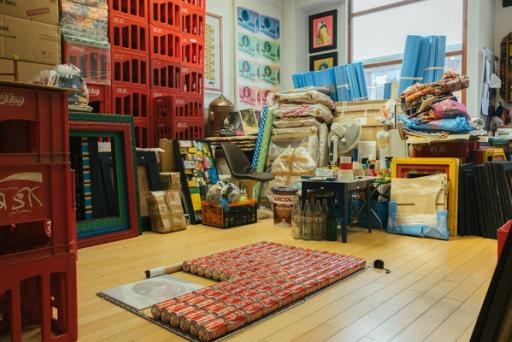 Tins, crates and storage boxes inside a studio.