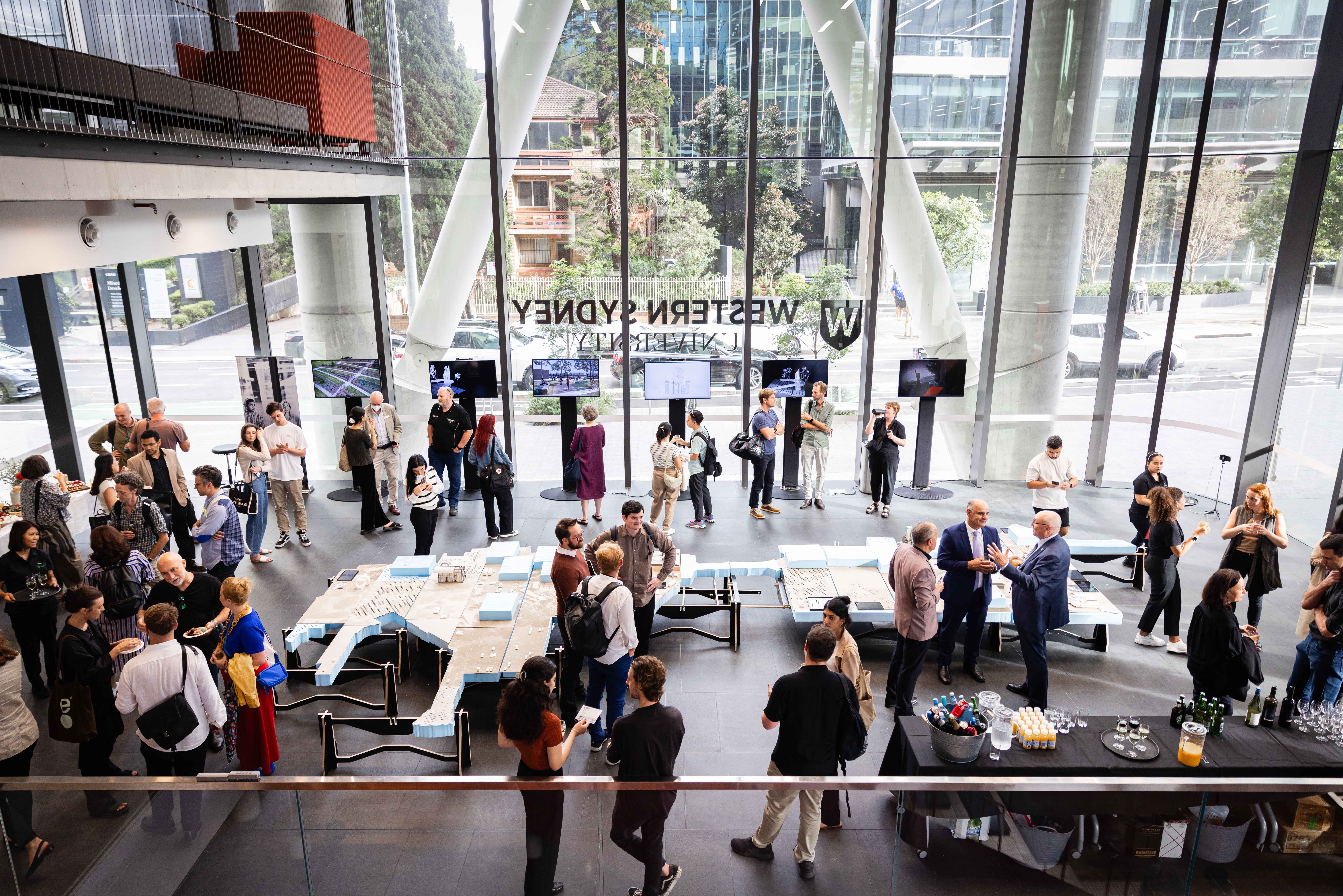 An event inside of a room with talk windows.