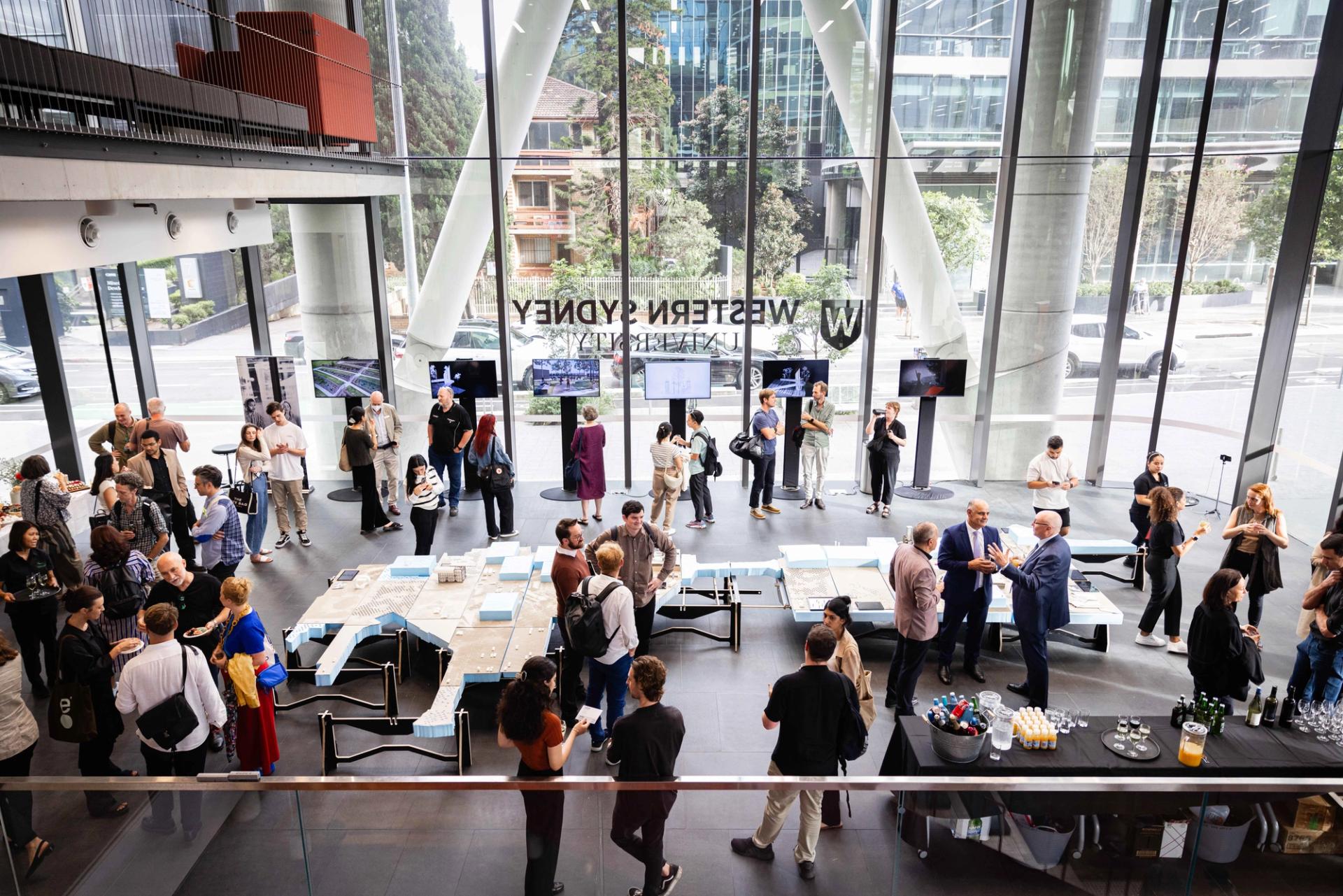 An event inside of a room with talk windows.