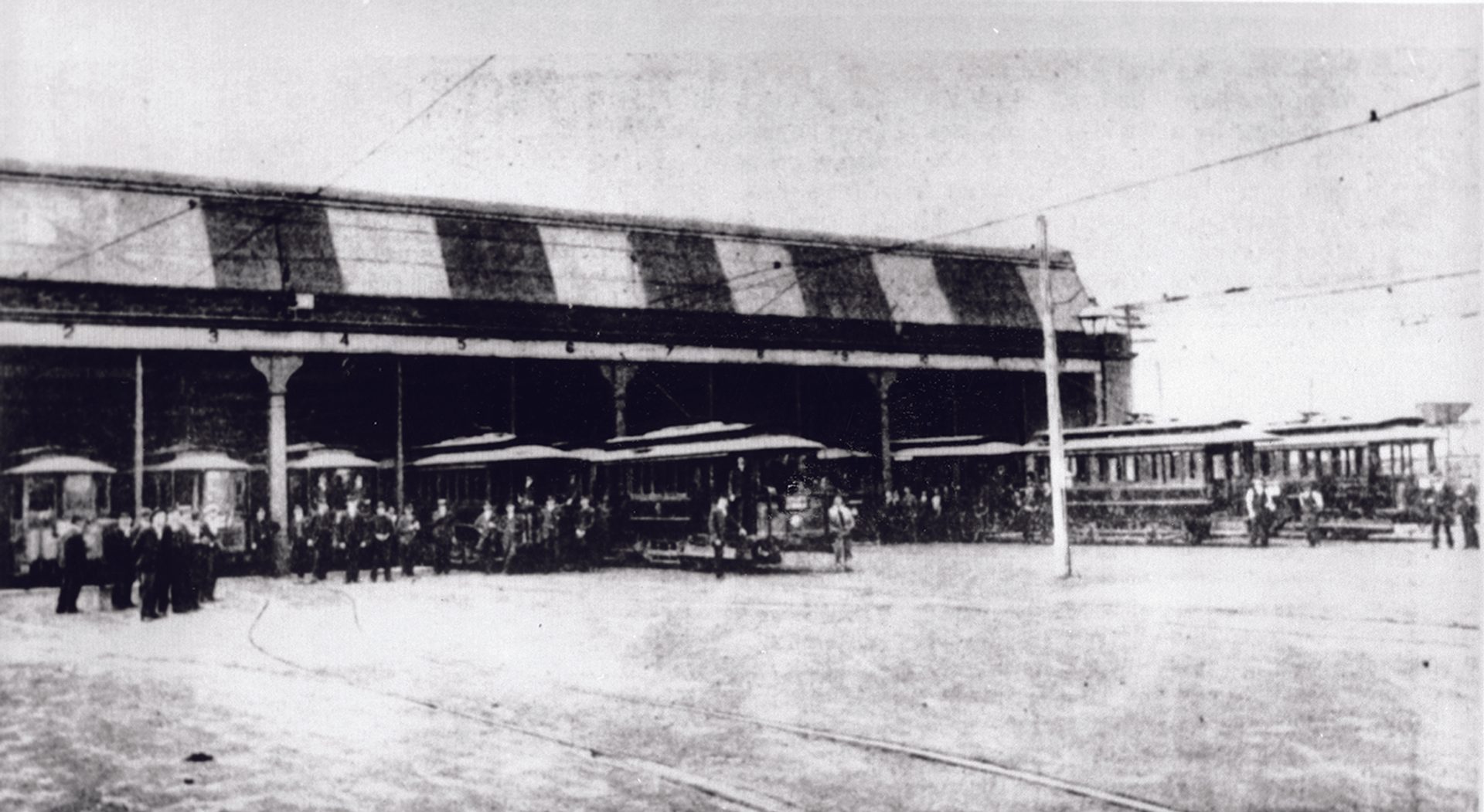 Vintage black and white photograph of tram yards