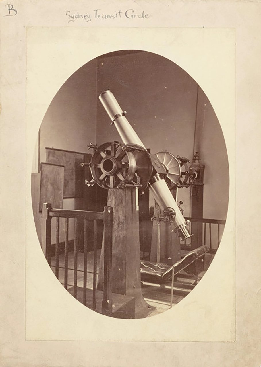 Sepia photographic card showing a vintage telescope