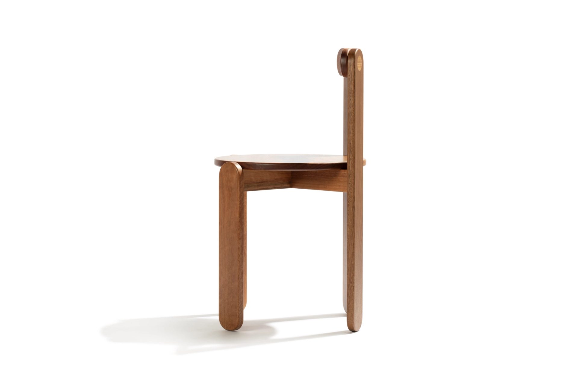 Side preview of a curved wooden chair.
