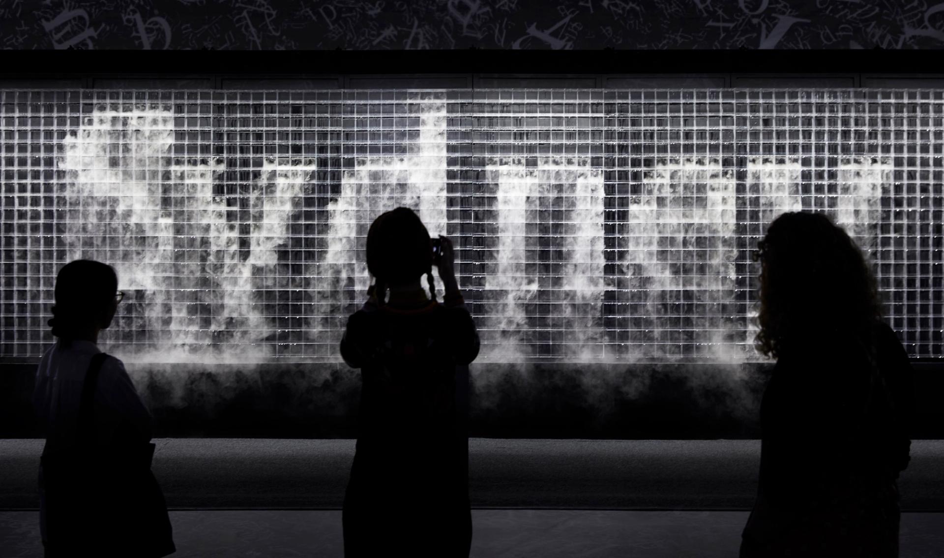 Mist in the shape of the word 'Sydney'
