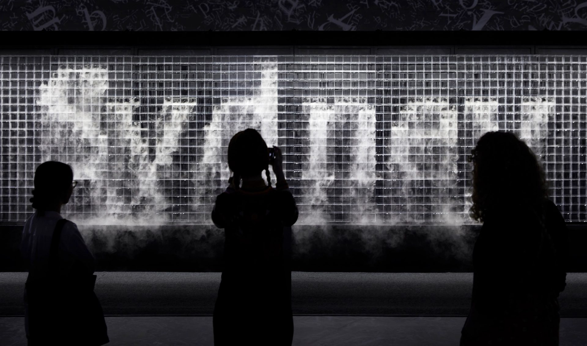 Mist in the shape of the word 'Sydney'