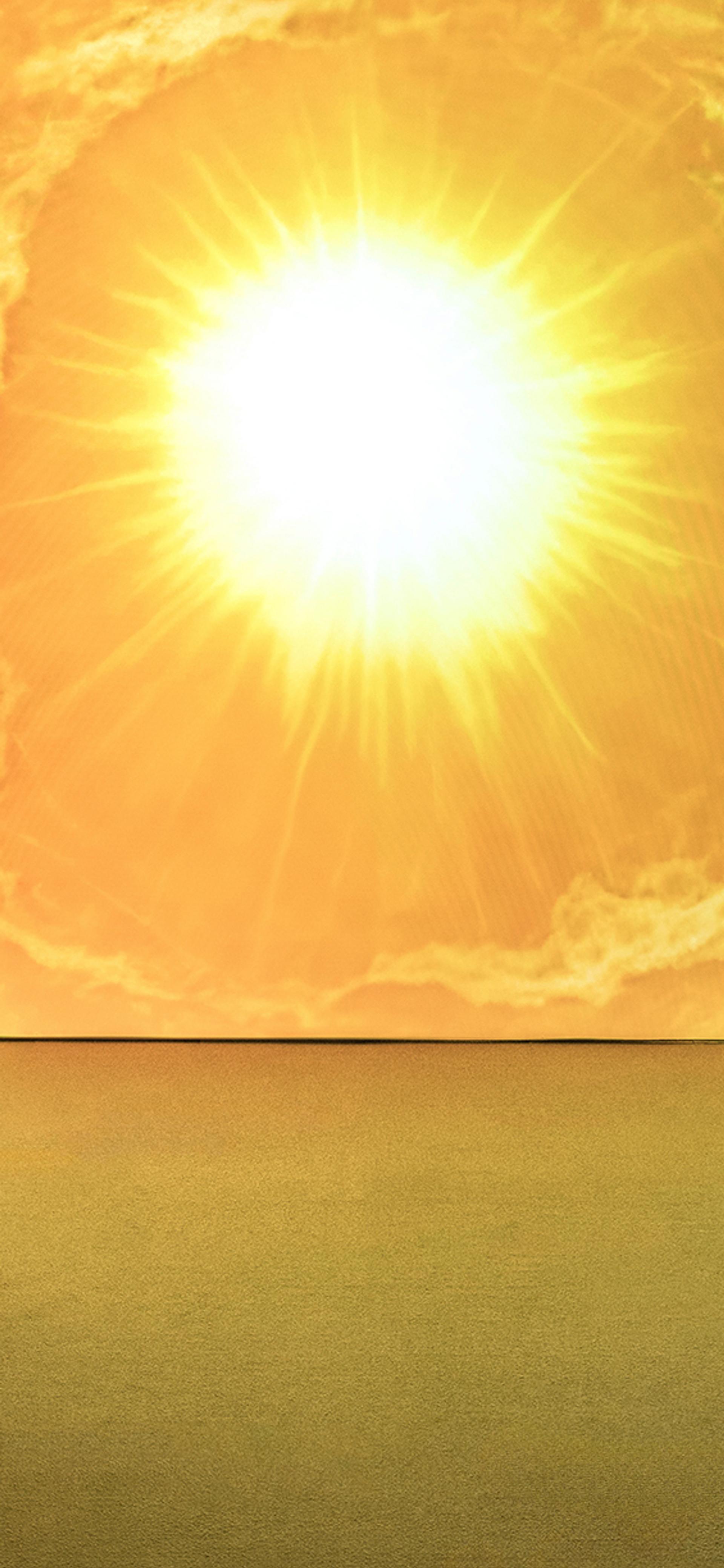 Man sits in front of projection of sun drawing